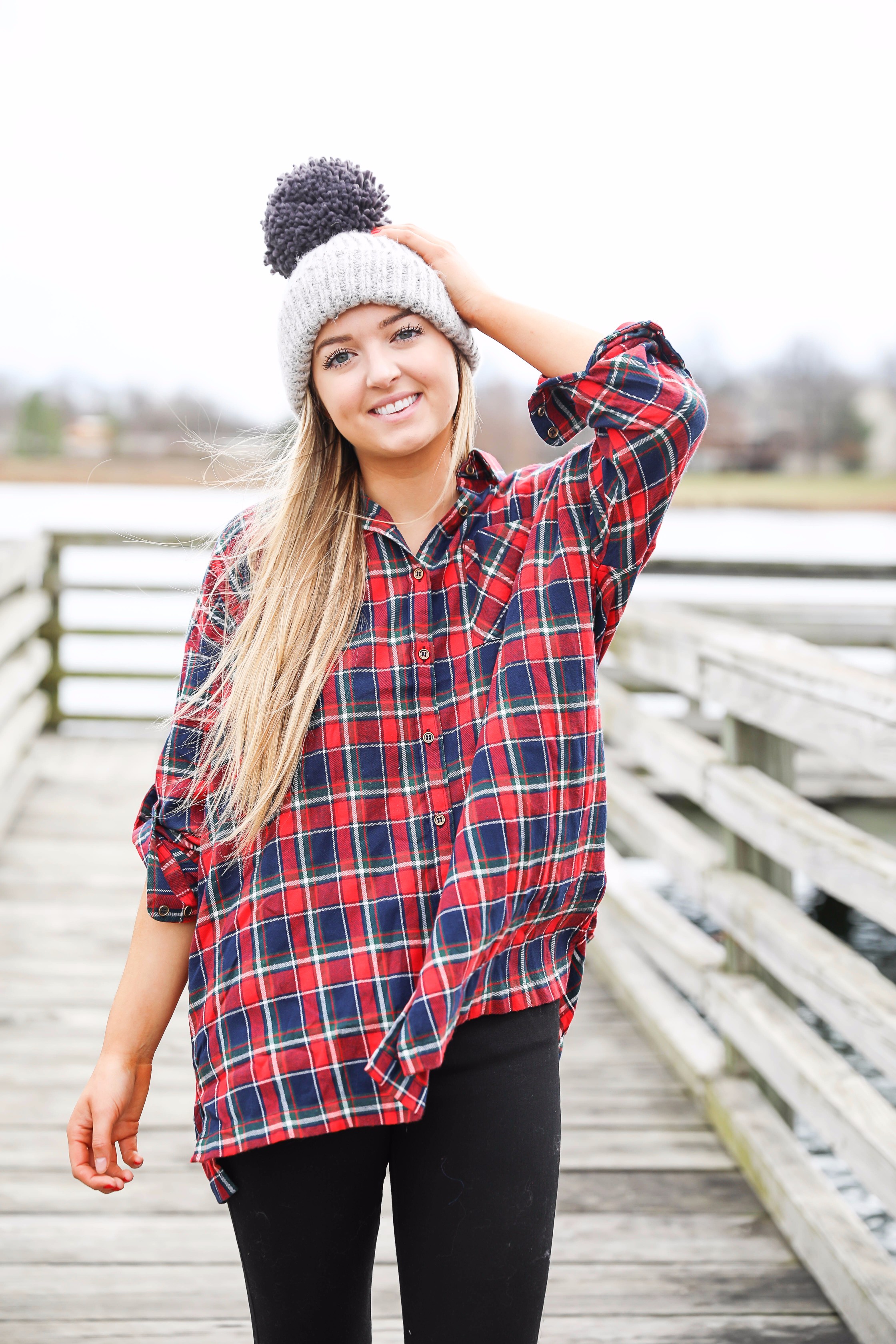 Cute flannel outfit with beanie and monogramed duck boots! Cute fall and winter camping outfit idea! Details on the fashion blog daily dose of charm by lauren lindmark