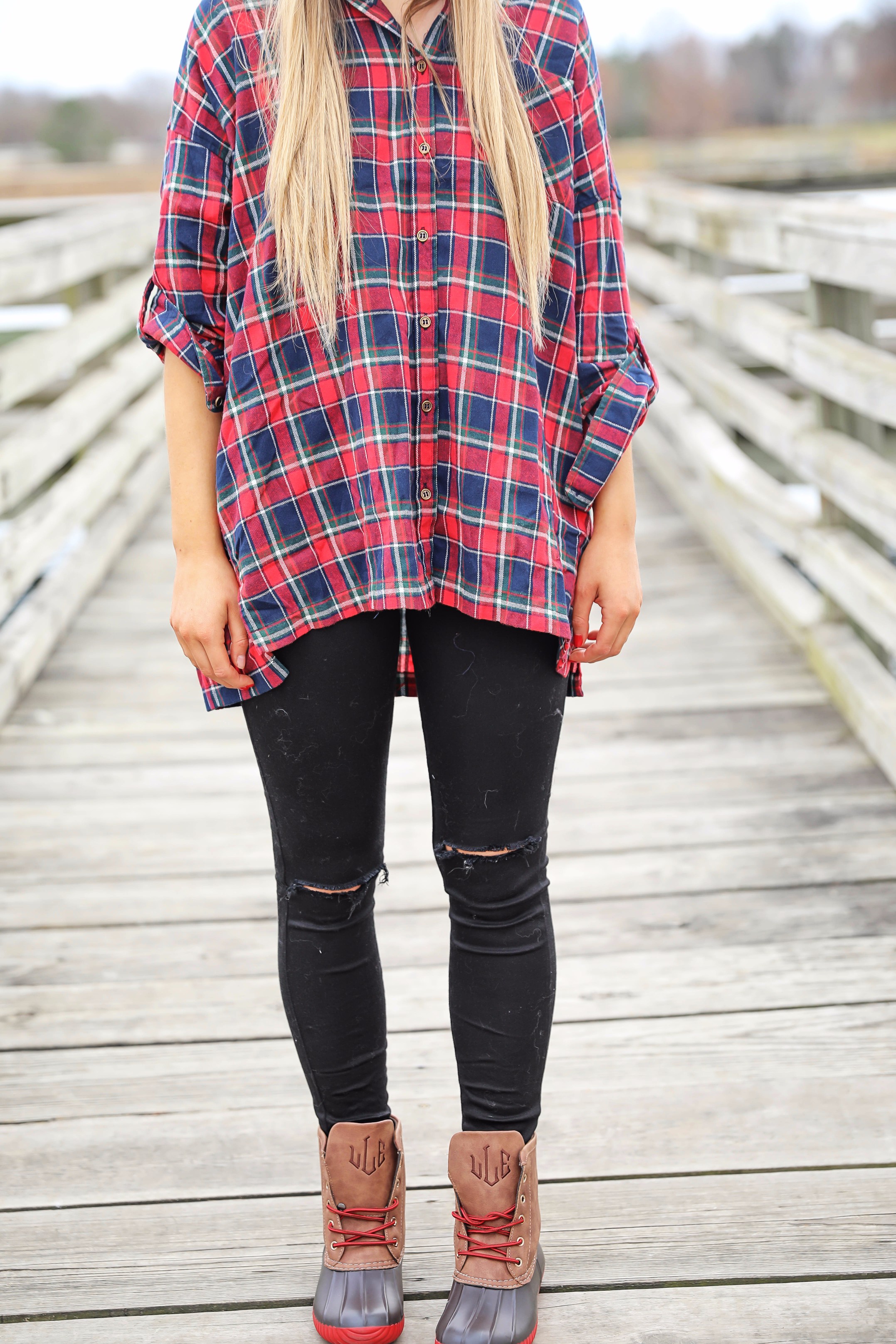 Cute flannel outfit with beanie and monogramed duck boots! Cute fall and winter camping outfit idea! Details on the fashion blog daily dose of charm by lauren lindmark