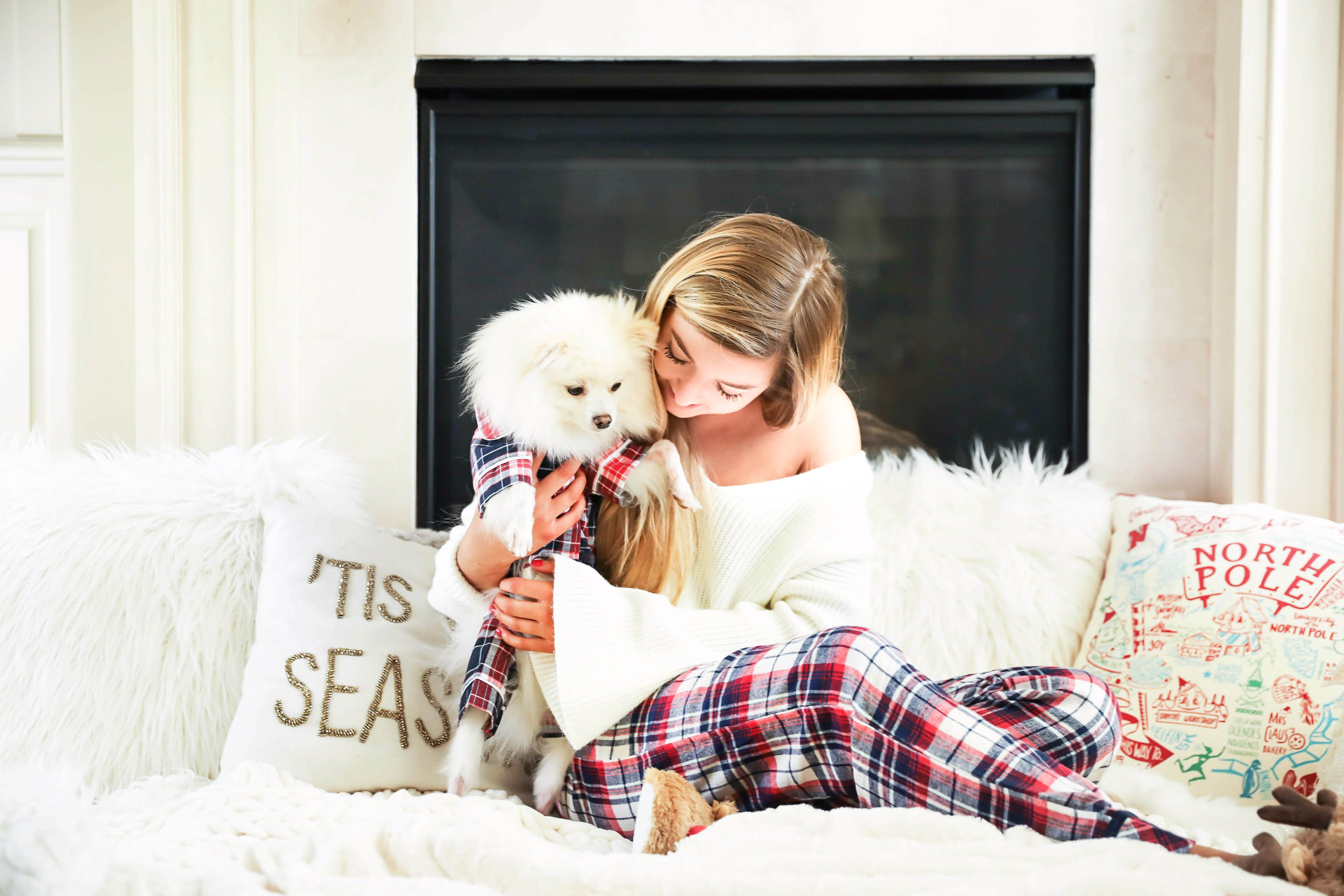 Matching pajamas with dog! Cute plaid matching pajamas with my white pomeranian! The cutest Pomeranian christmas photos! Details on fashion blog daily dose of charm by lauren lindmark