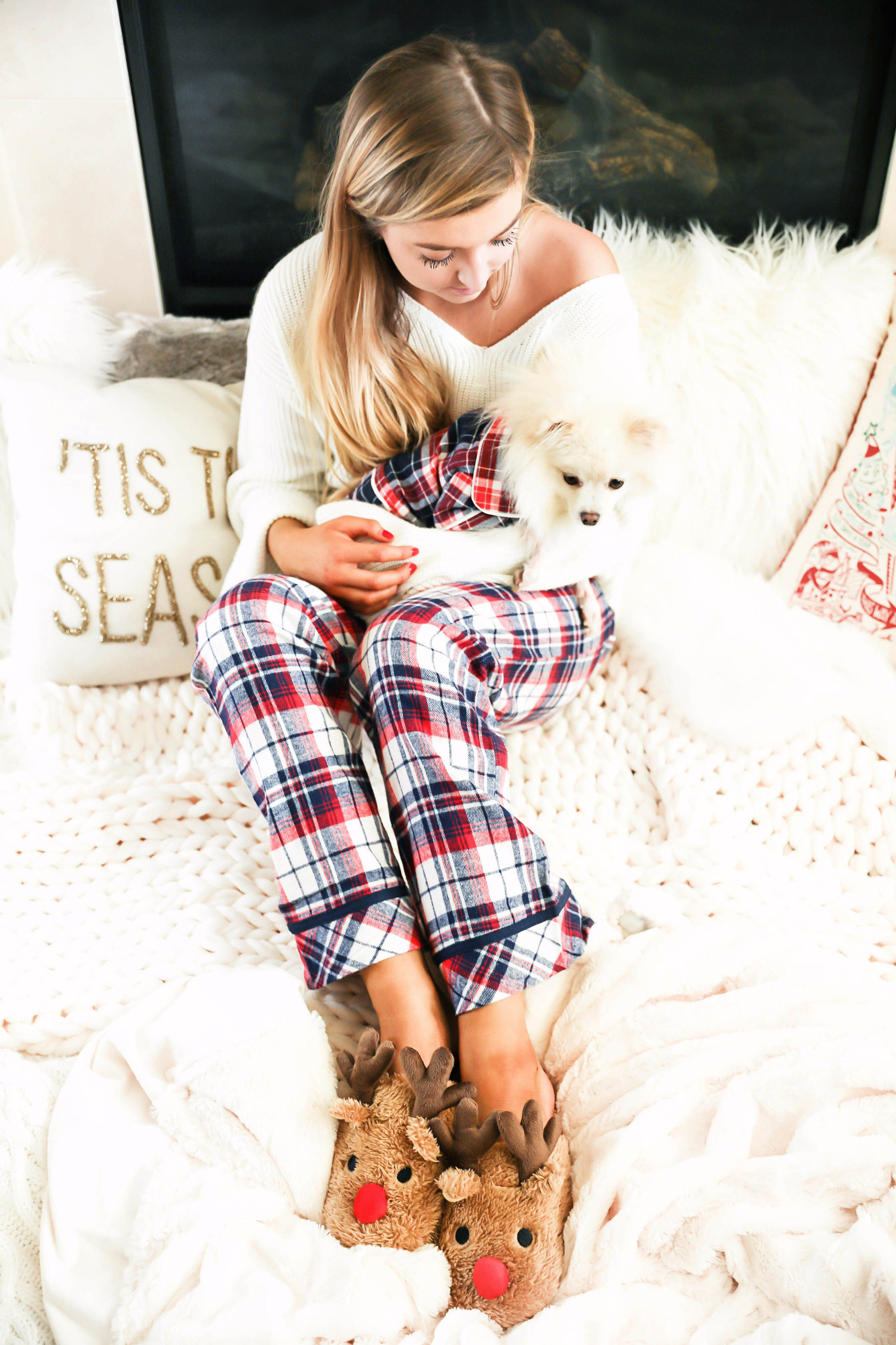 Matching pajamas with dog! Cute plaid matching pajamas with my white pomeranian! The cutest Pomeranian christmas photos! Details on fashion blog daily dose of charm by lauren lindmark