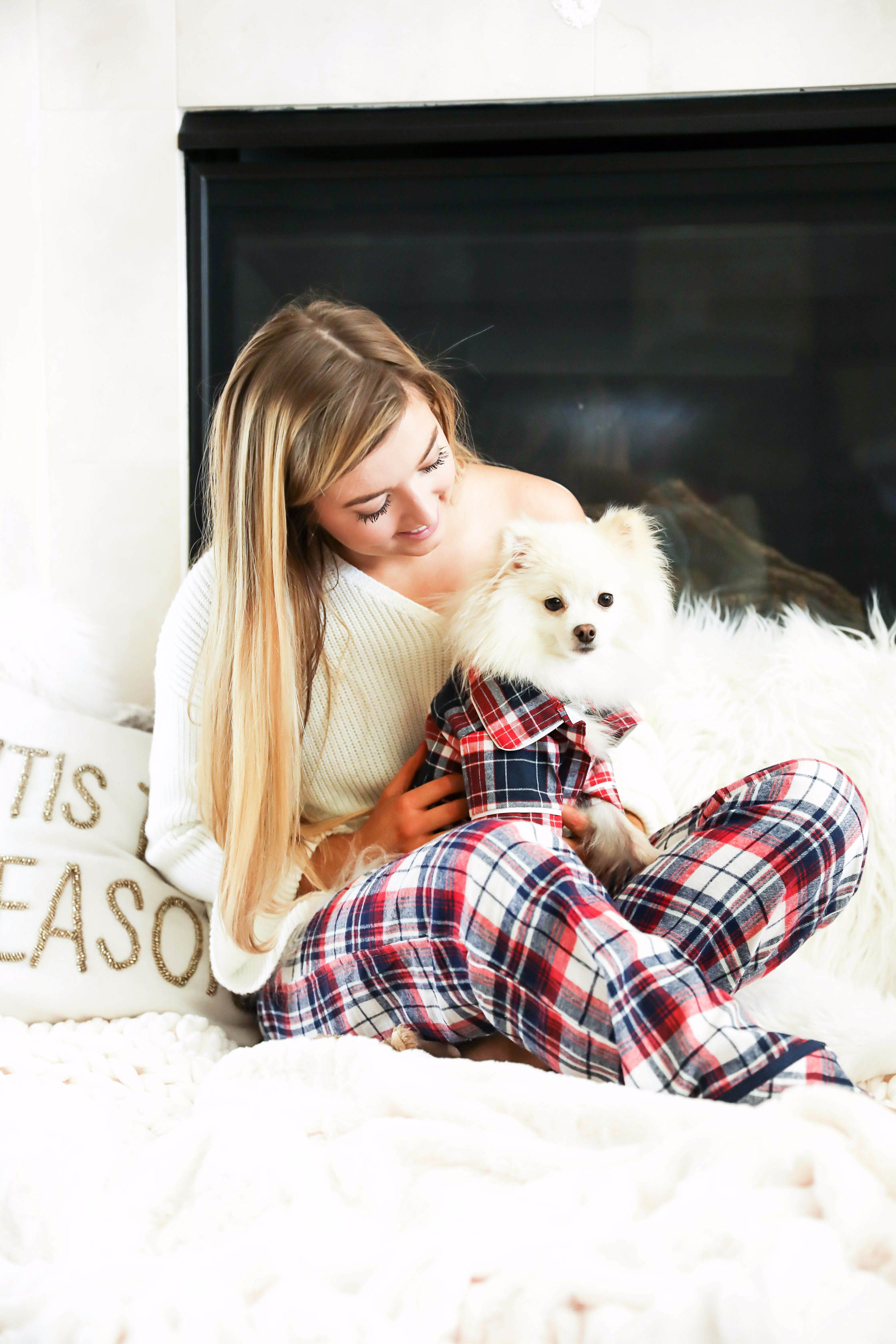 Matching pajamas with dog! Cute plaid matching pajamas with my white pomeranian! The cutest Pomeranian christmas photos! Details on fashion blog daily dose of charm by lauren lindmark