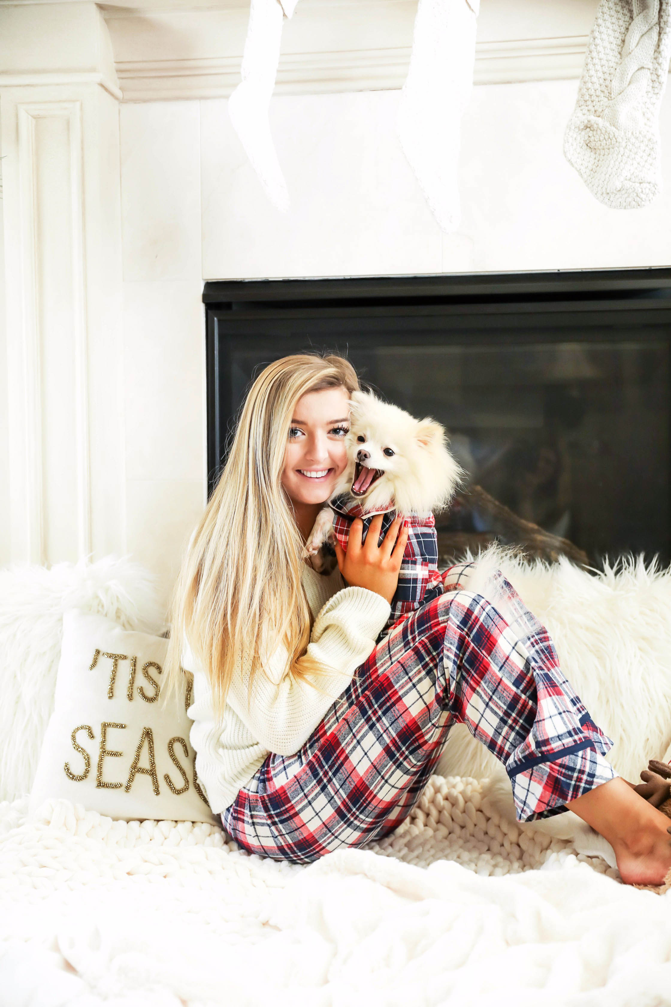 Matching pajamas with dog! Cute plaid matching pajamas with my white pomeranian! The cutest Pomeranian christmas photos! Details on fashion blog daily dose of charm by lauren lindmark