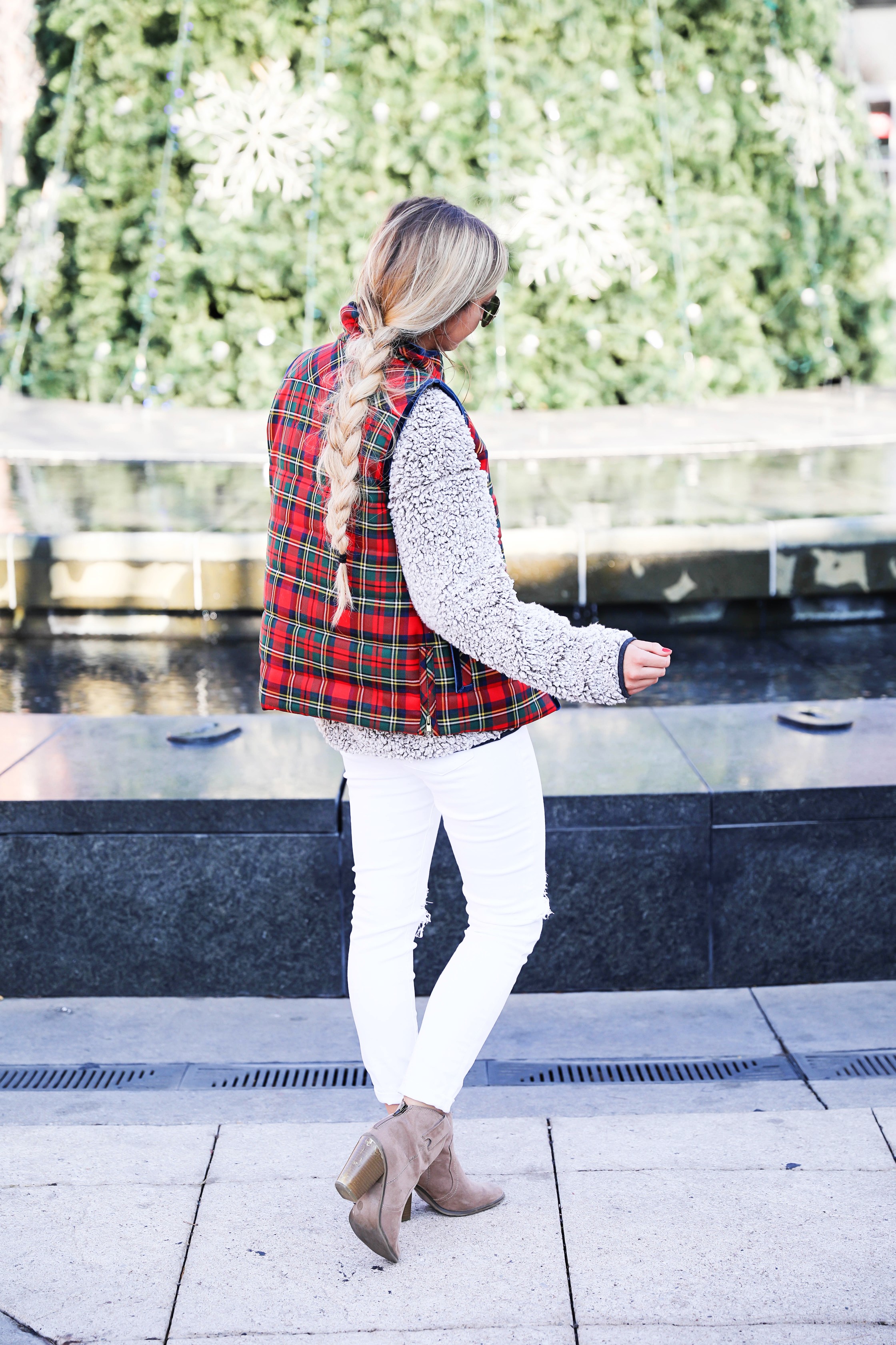 Tartan plaid j.crew vest with Dylan true grit comfy crewneck sweatshirt with white ripped jeans and side braid with long hair. Find the details for this winter outfit on fashion blog daily dose of charm by lauren Lindmark 