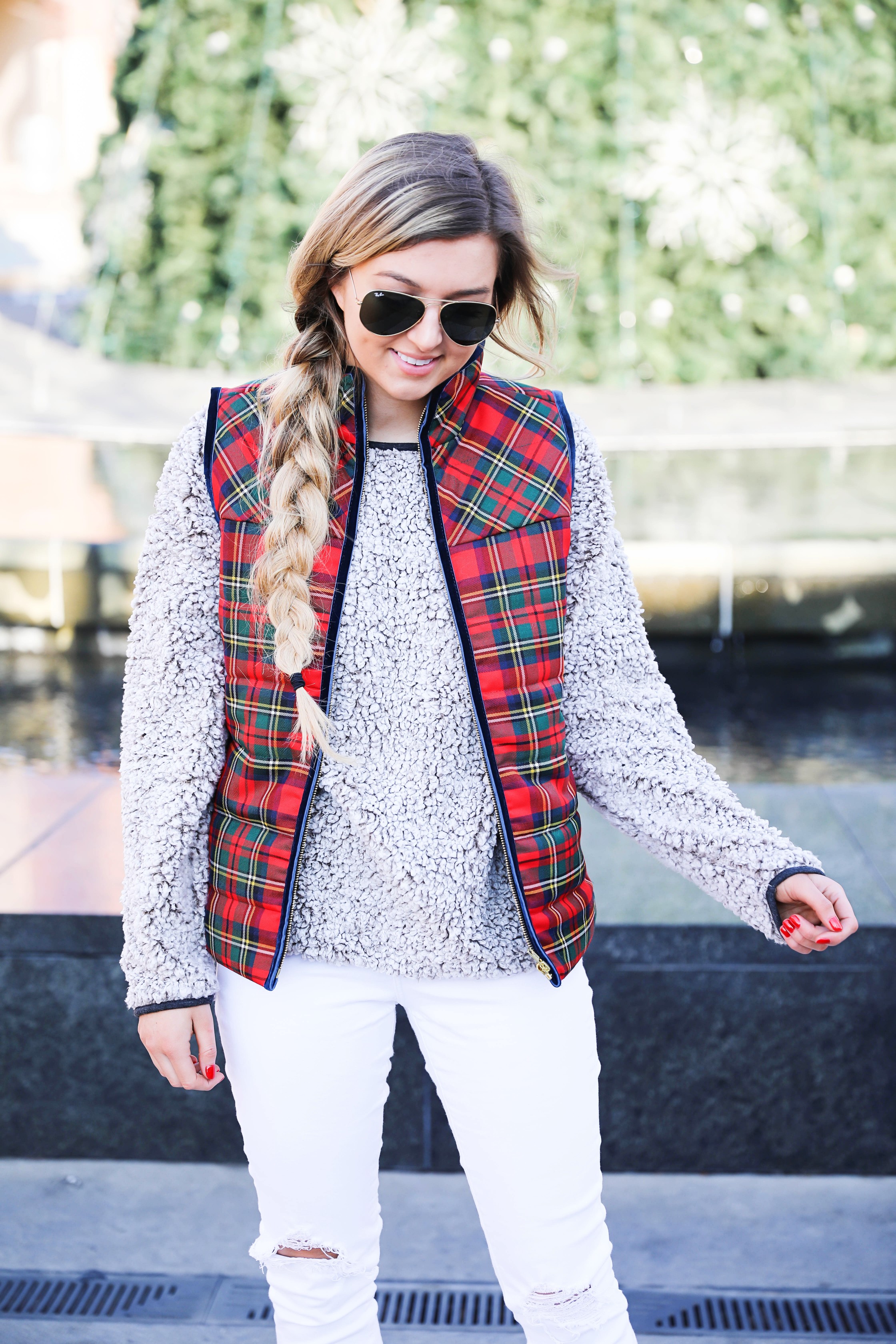 Tartan plaid j.crew vest with Dylan true grit comfy crewneck sweatshirt with white ripped jeans and side braid with long hair. Find the details for this winter outfit on fashion blog daily dose of charm by lauren Lindmark 