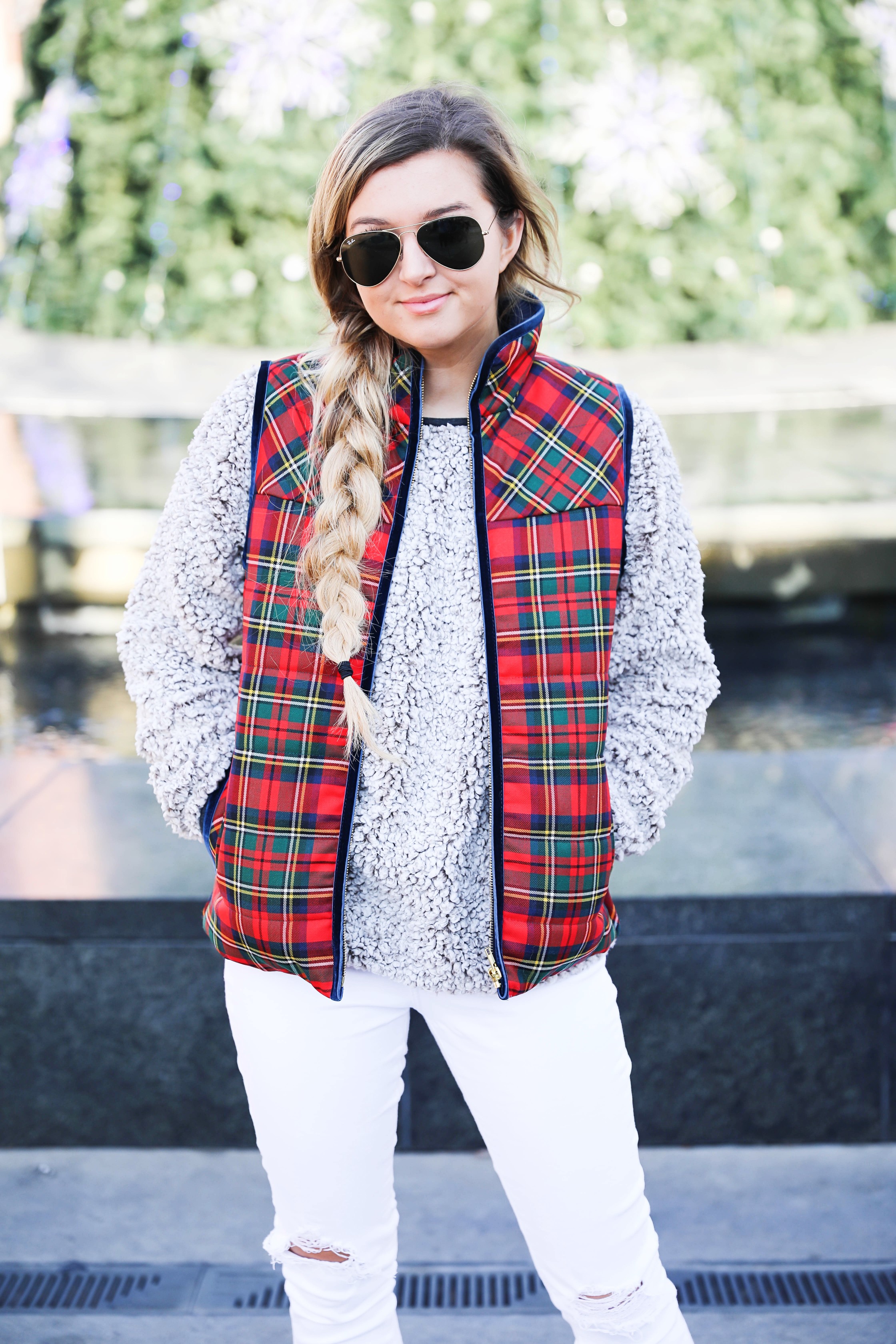Tartan plaid j.crew vest with Dylan true grit comfy crewneck sweatshirt with white ripped jeans and side braid with long hair. Find the details for this winter outfit on fashion blog daily dose of charm by lauren Lindmark 