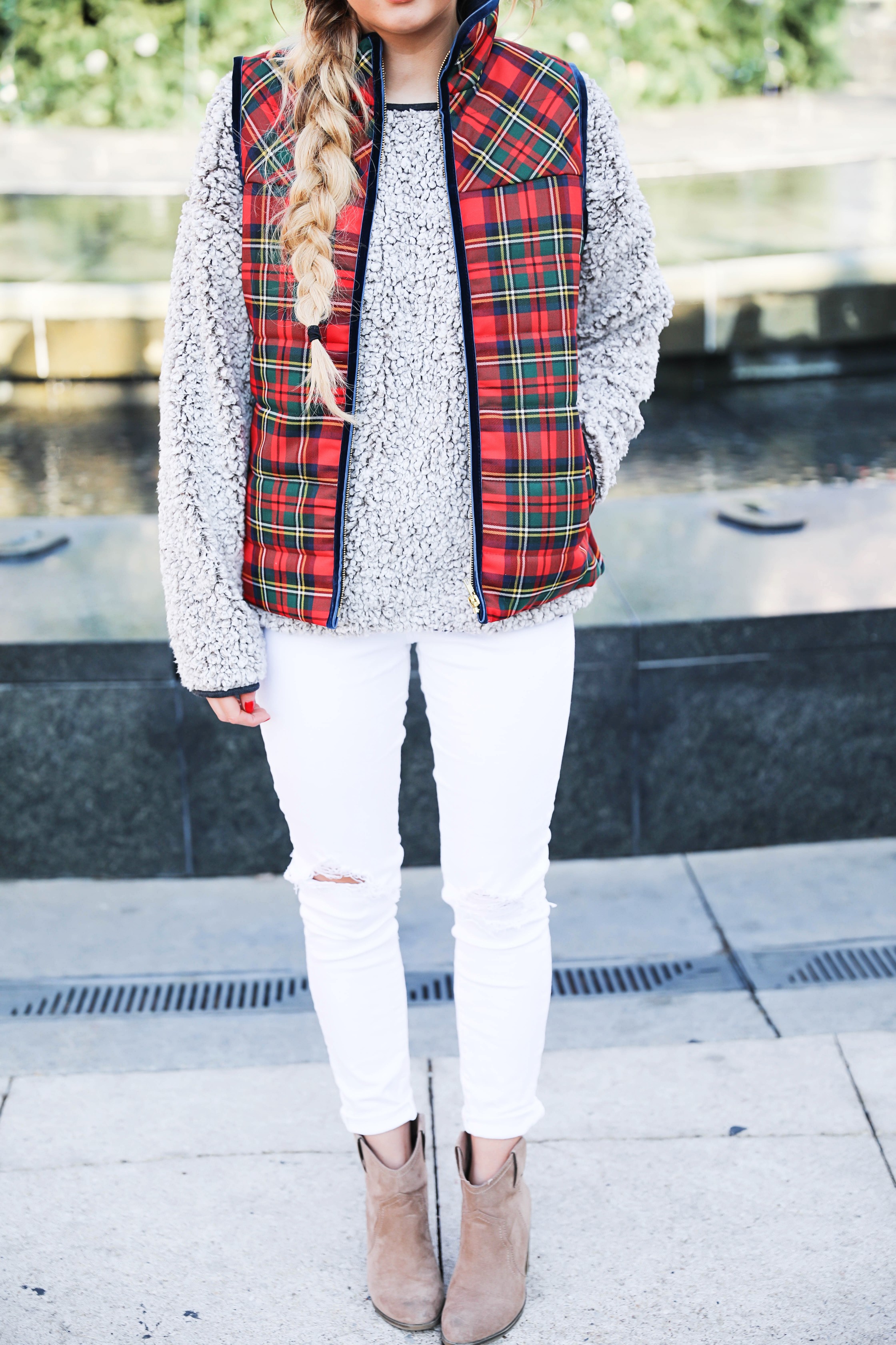 Tartan plaid j.crew vest with Dylan true grit comfy crewneck sweatshirt with white ripped jeans and side braid with long hair. Find the details for this winter outfit on fashion blog daily dose of charm by lauren Lindmark 