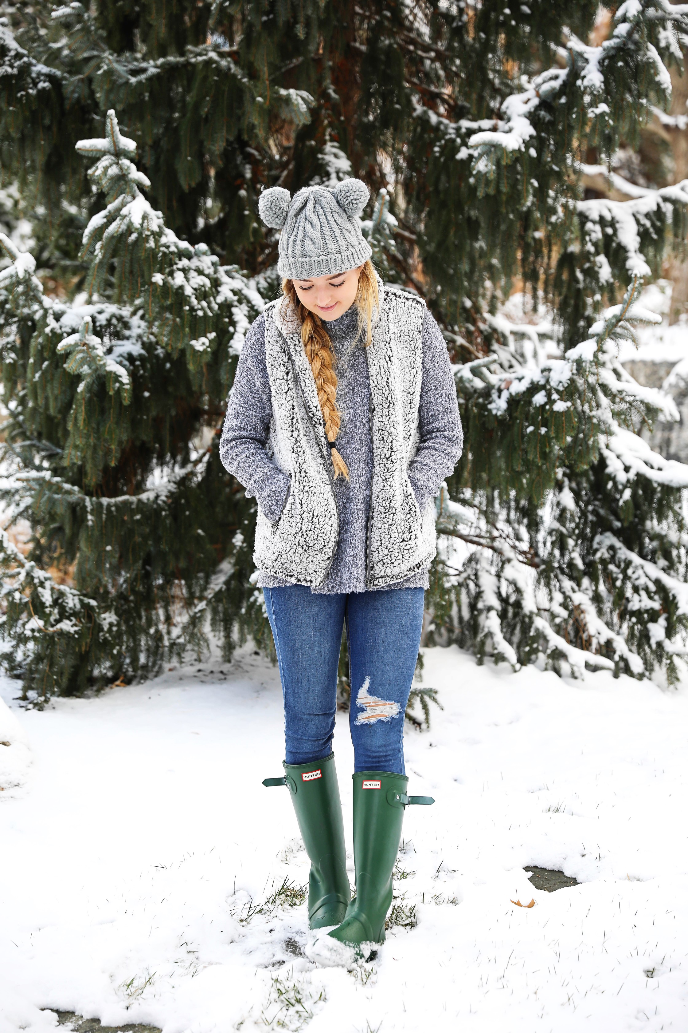 This sherpa vest is the coziest thing I own! I paired it with this soft grey sweater that has a cute turtleneck. I am also wearing my grey pom pom beanie! It has two pom poms which is super cute! I love this winter outfit! Details on fashion blog daily dose of charm by lauren lindmark