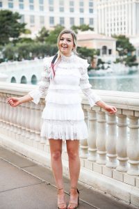 Bellagio fountains in Las Vegas! Wearing a white lace dress and scarf in my pony tail! Las Vegas style! Las vegas blogger! Details on daily dose of charm by lauren lindmark