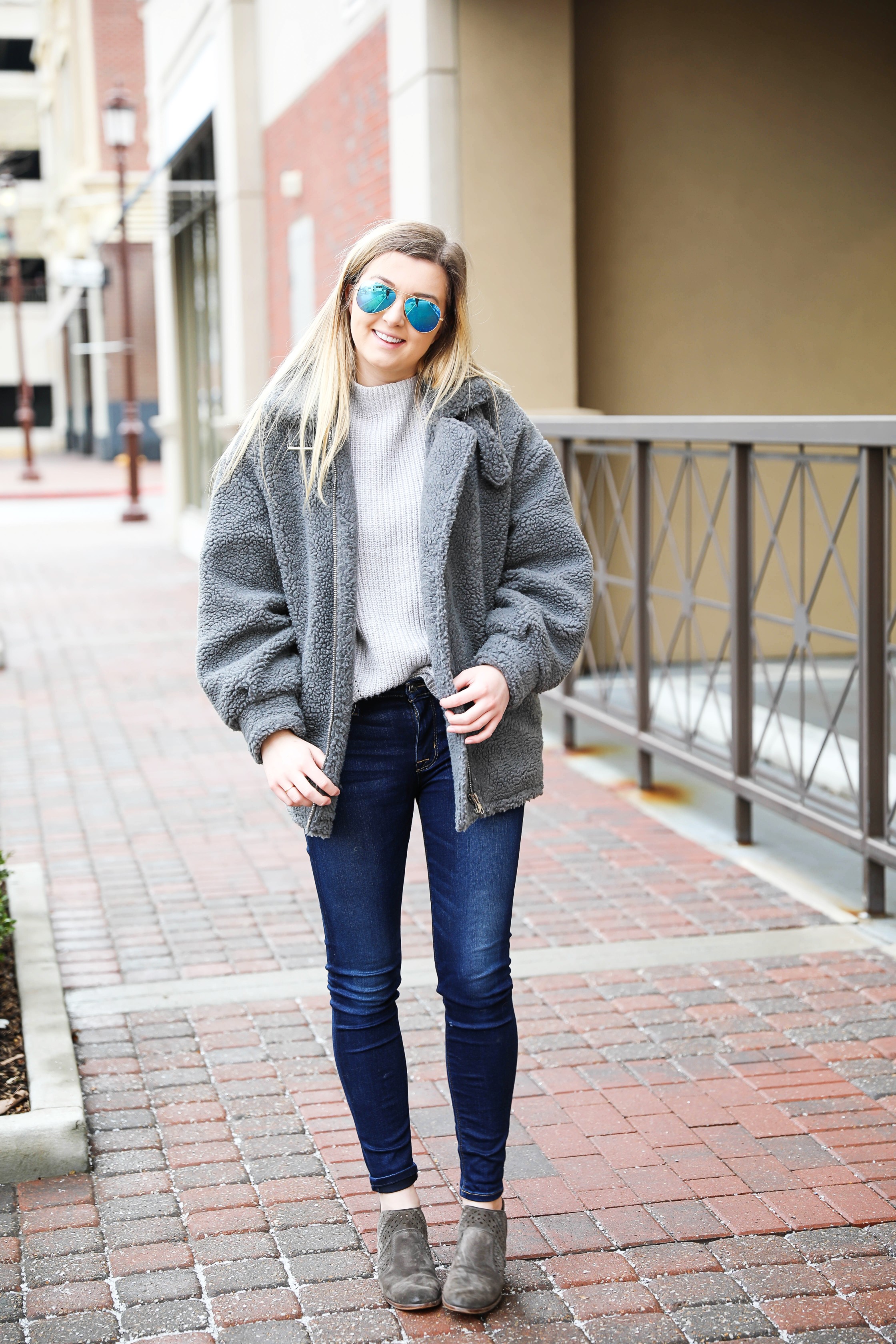 Fuzzy grey aviator coat! Paired this soft jacket with my favorite ray ban blue mirrored aviators! Details on fashion blog daily dose of charm by lauren lindmark