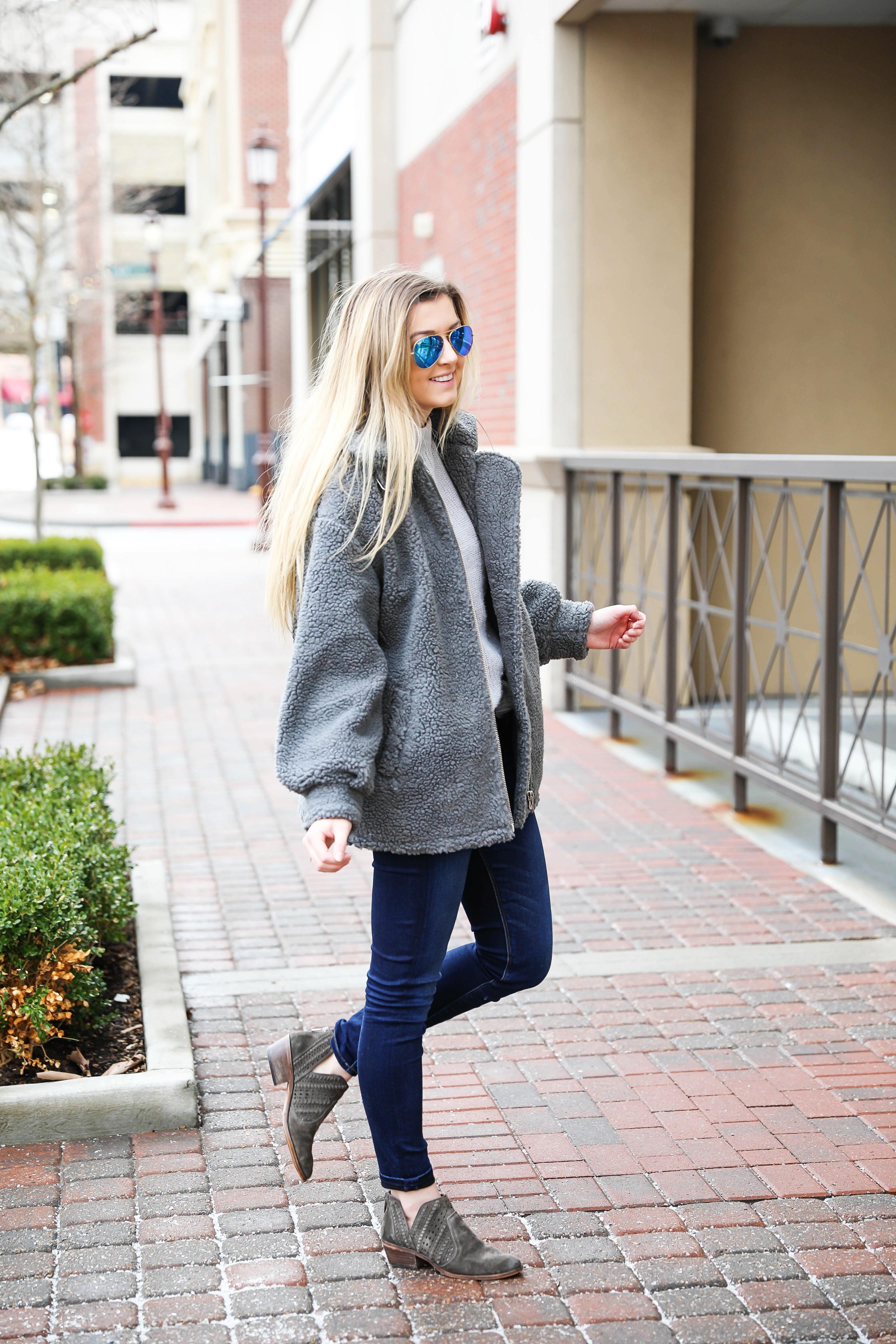 Fuzzy grey aviator coat! Paired this soft jacket with my favorite ray ban blue mirrored aviators! Details on fashion blog daily dose of charm by lauren lindmark