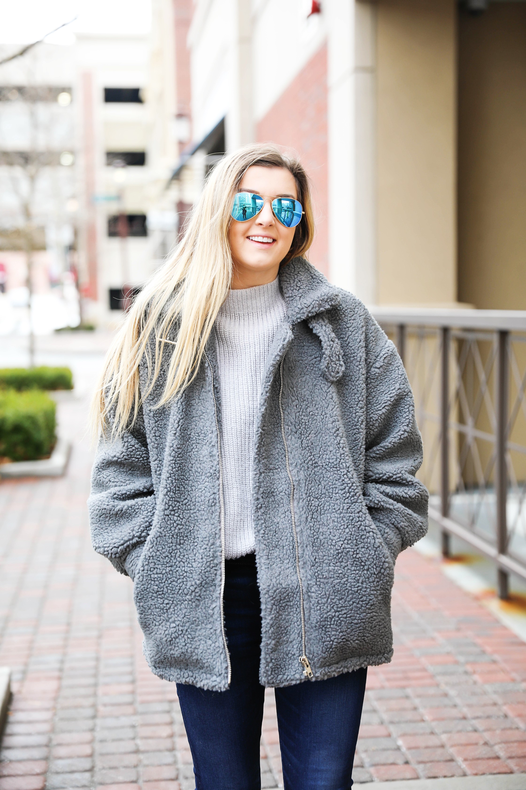 Fuzzy grey aviator coat! Paired this soft jacket with my favorite ray ban blue mirrored aviators! Details on fashion blog daily dose of charm by lauren lindmark