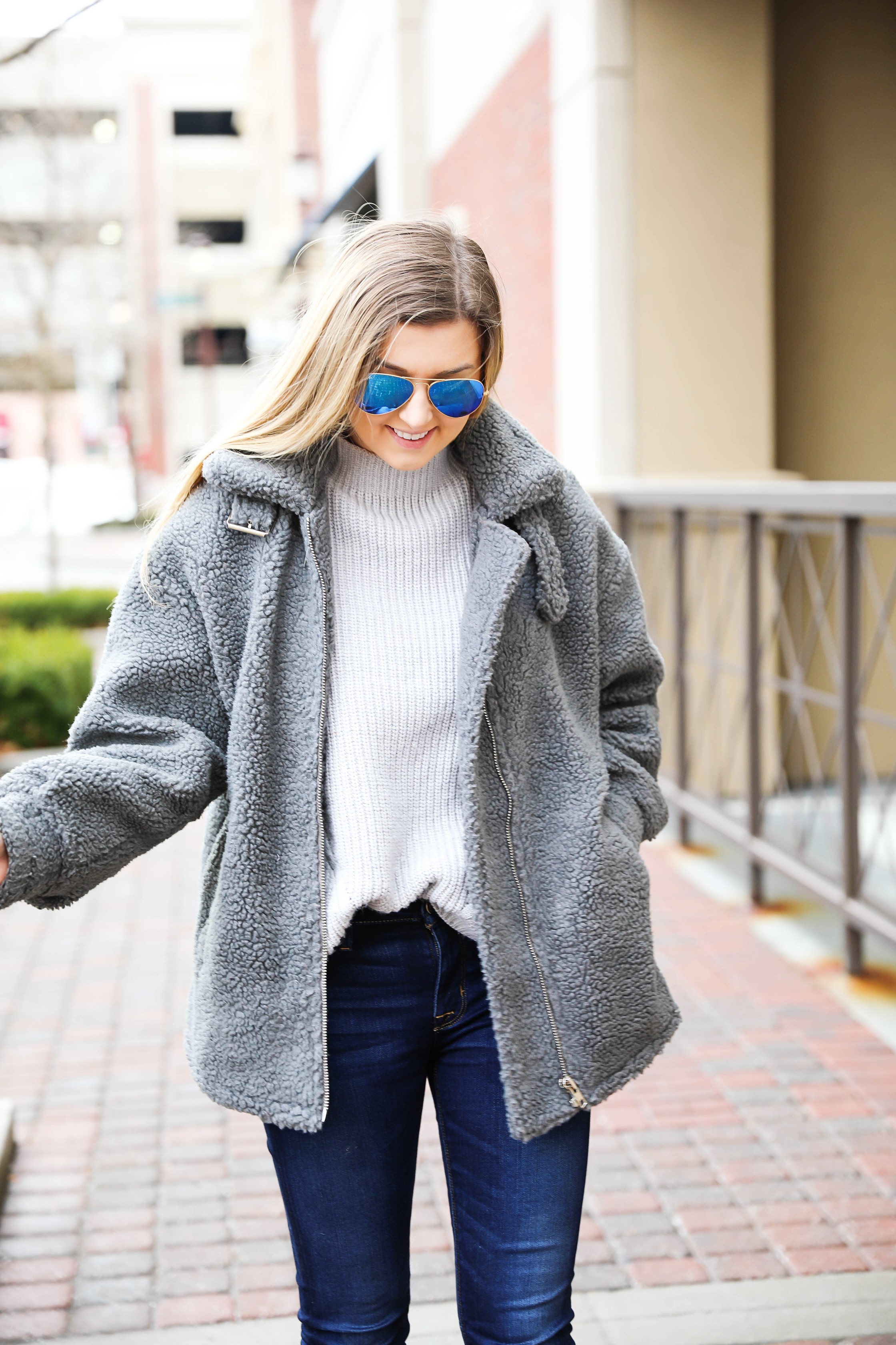 Fuzzy grey aviator coat! Paired this soft jacket with my favorite ray ban blue mirrored aviators! Details on fashion blog daily dose of charm by lauren lindmark