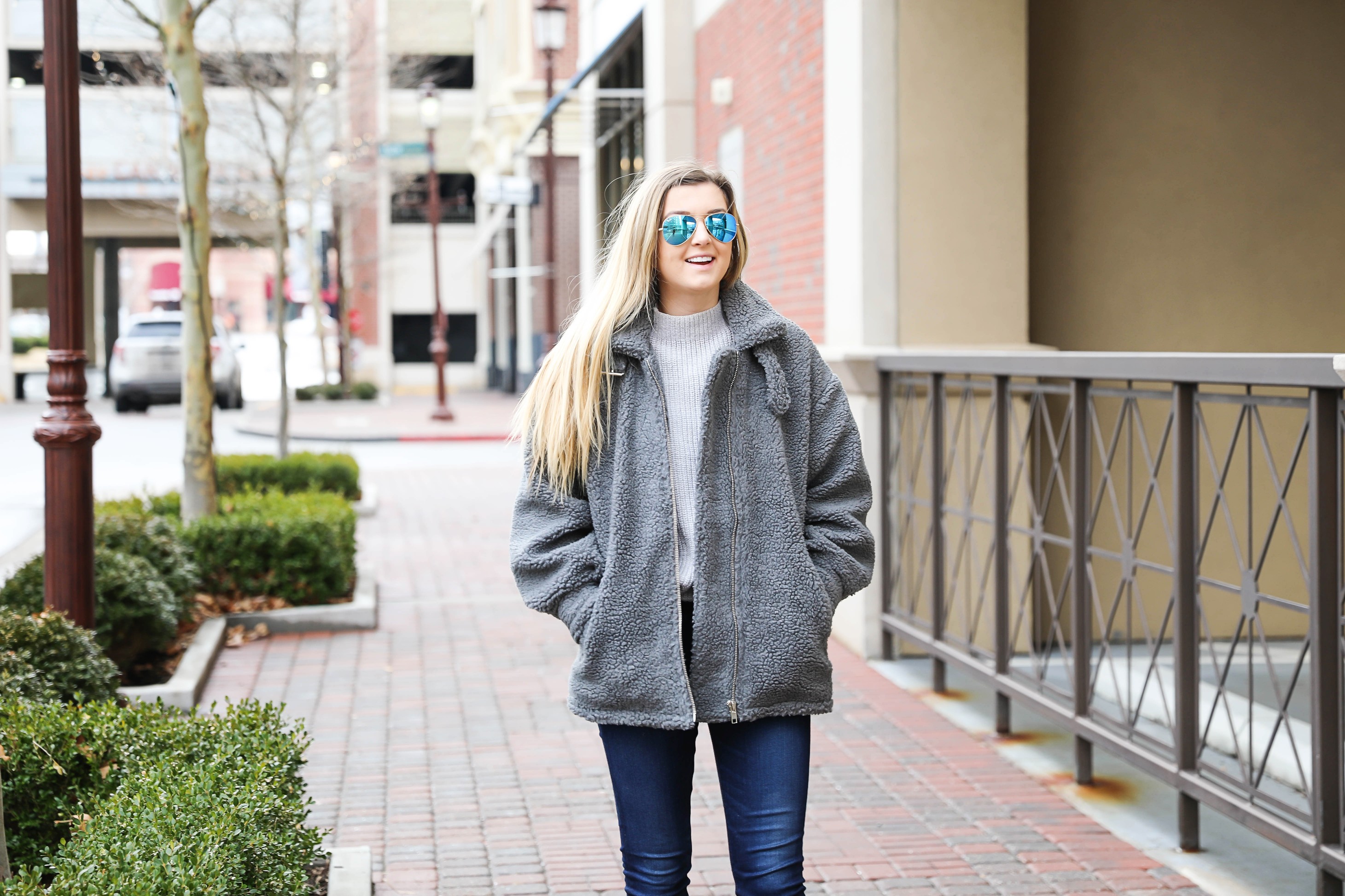 Fuzzy grey aviator coat! Paired this soft jacket with my favorite ray ban blue mirrored aviators! Details on fashion blog daily dose of charm by lauren lindmark