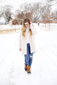 Nice winter coat! Winter coat roundup on the blog! I love this pink coat, it is sort of off white looking! Details on fashion blog daily dose of charm by lauren lindmark