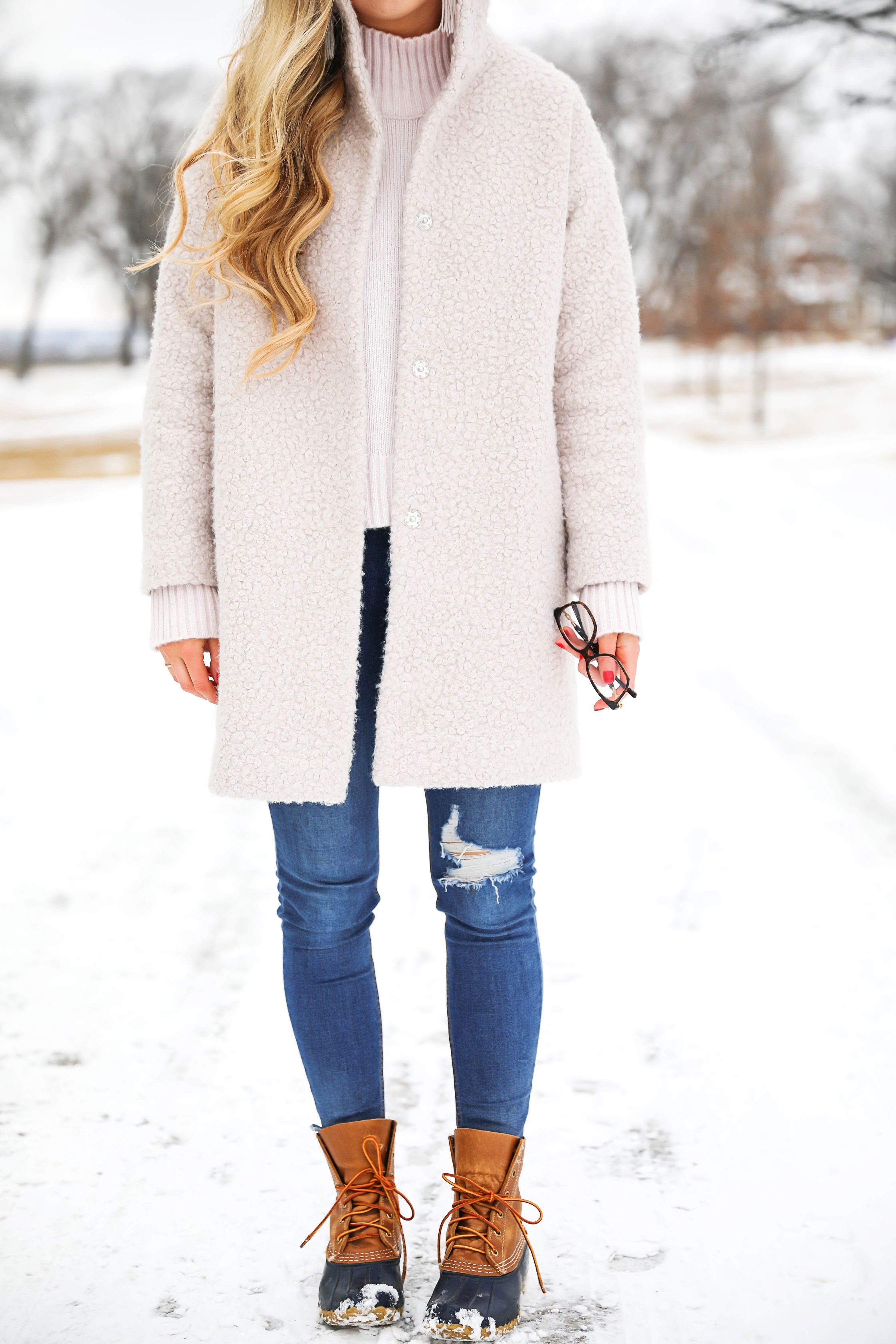 Nice winter coat! Winter coat roundup on the blog! I love this pink coat, it is sort of off white looking! Details on fashion blog daily dose of charm by lauren lindmark