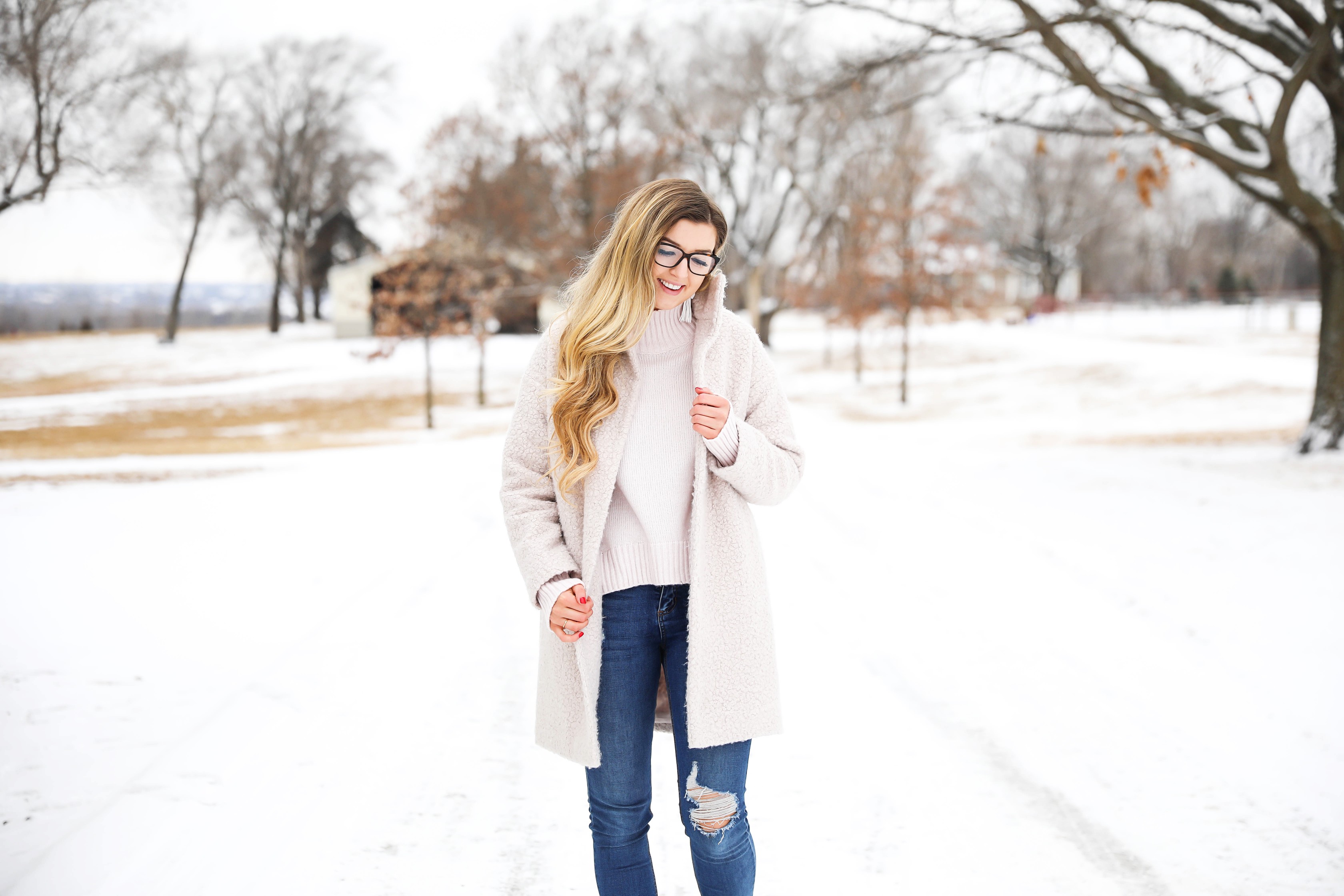 Nice winter coat! Winter coat roundup on the blog! I love this pink coat, it is sort of off white looking! Details on fashion blog daily dose of charm by lauren lindmark