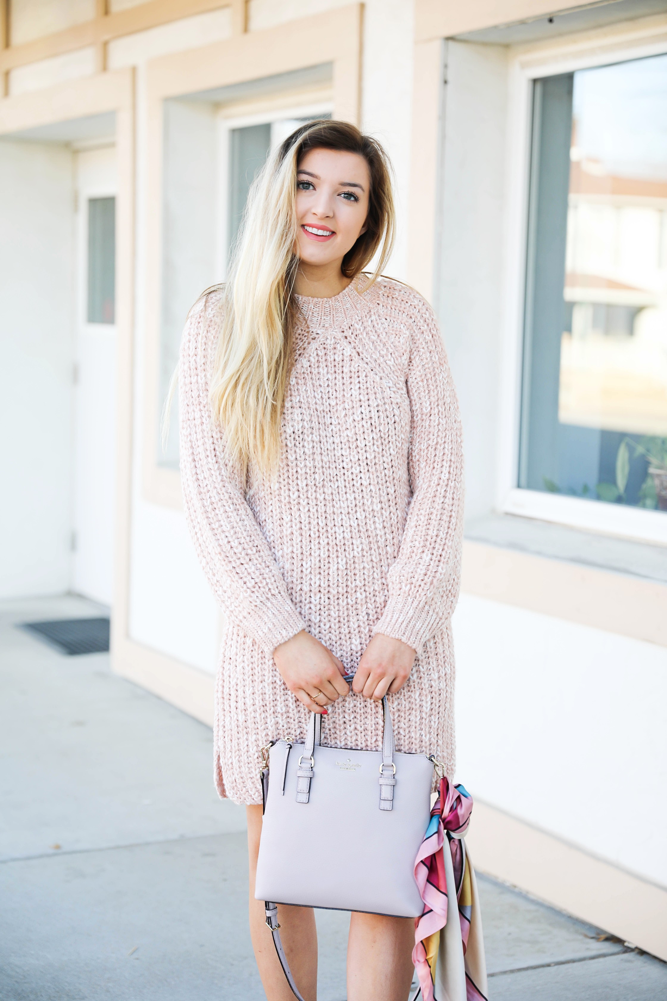 Pink sweater dress with kate spade bag! I love this Kate Spade bag with the pink scarf tied on it! It really adds some cute feminine flair! My new favorite purse! Details on fashion blog daily dose of charm by lauren lindmark