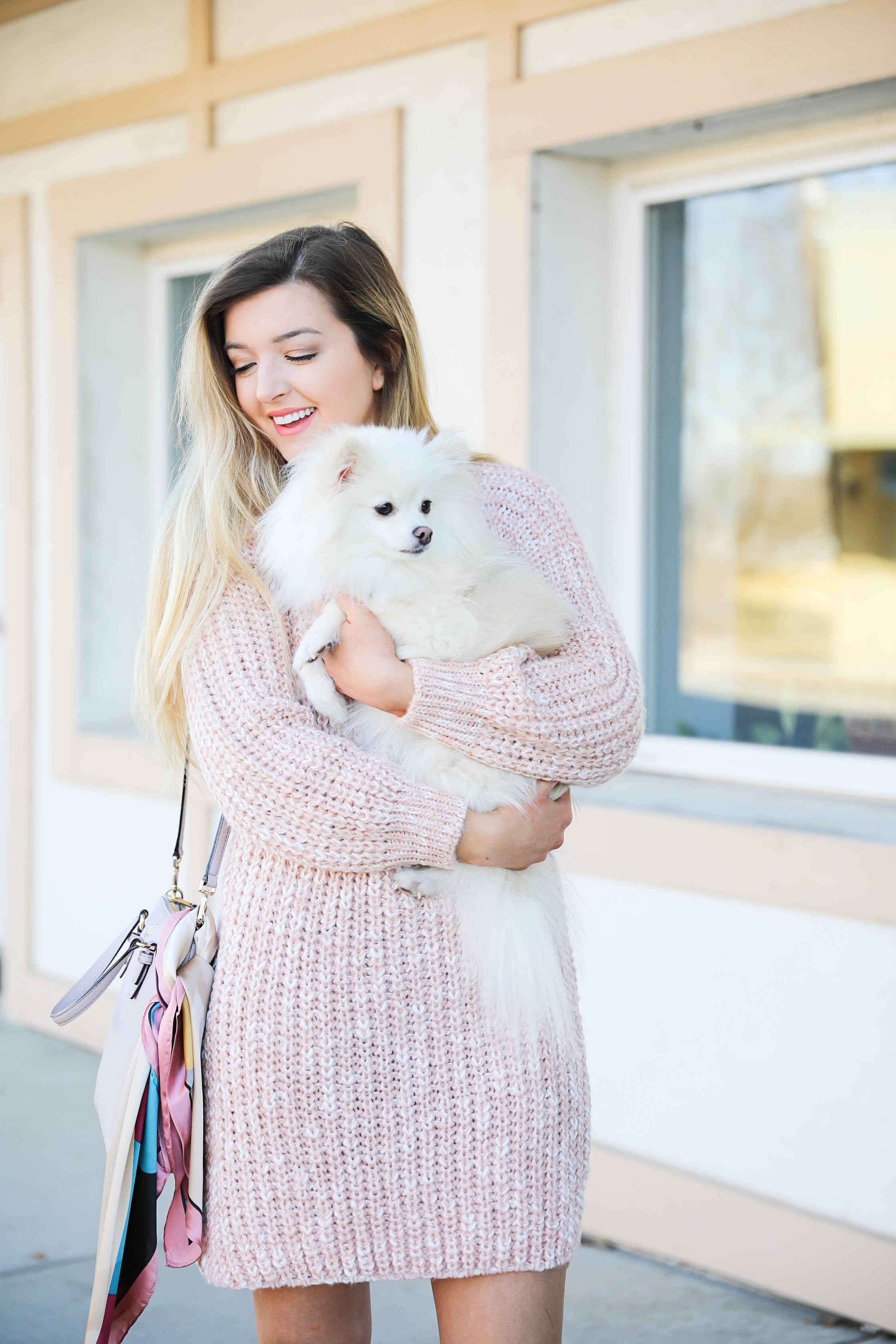 Pink sweater dress with kate spade bag! I love this Kate Spade bag with the pink scarf tied on it! It really adds some cute feminine flair! My new favorite purse! Details on fashion blog daily dose of charm by lauren lindmark