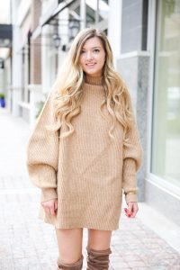 Tan sweater dress from h&m with puffy sleeves. Paired with tan over the knee heeled boots! I love otk boots for winter and spring. Details on fashion blog daily dose of charm by lauren lindmark