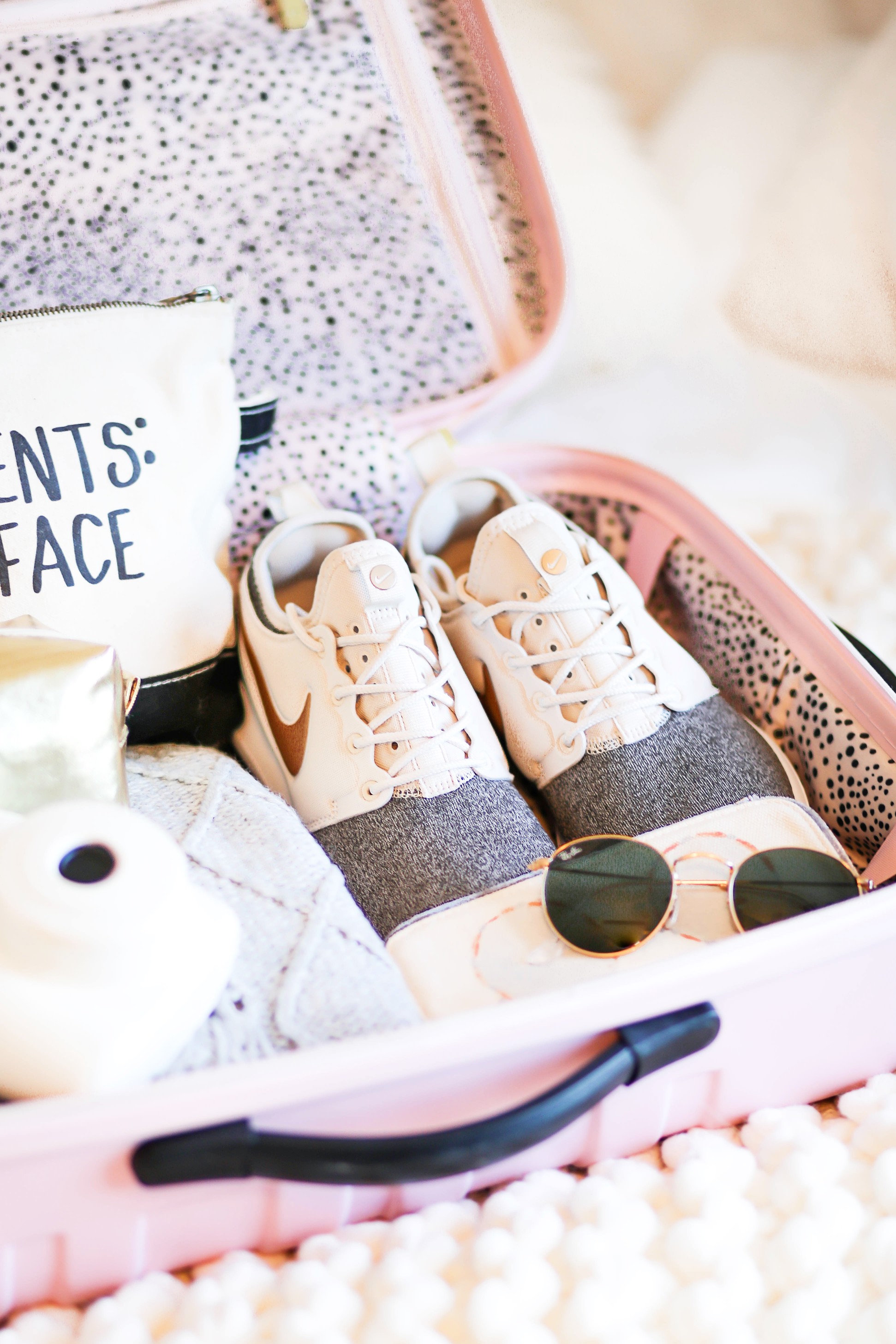 suitcase packing pink suitcase packed suitcase cute suitcase packing tips daily dose of charm lauren lindmark