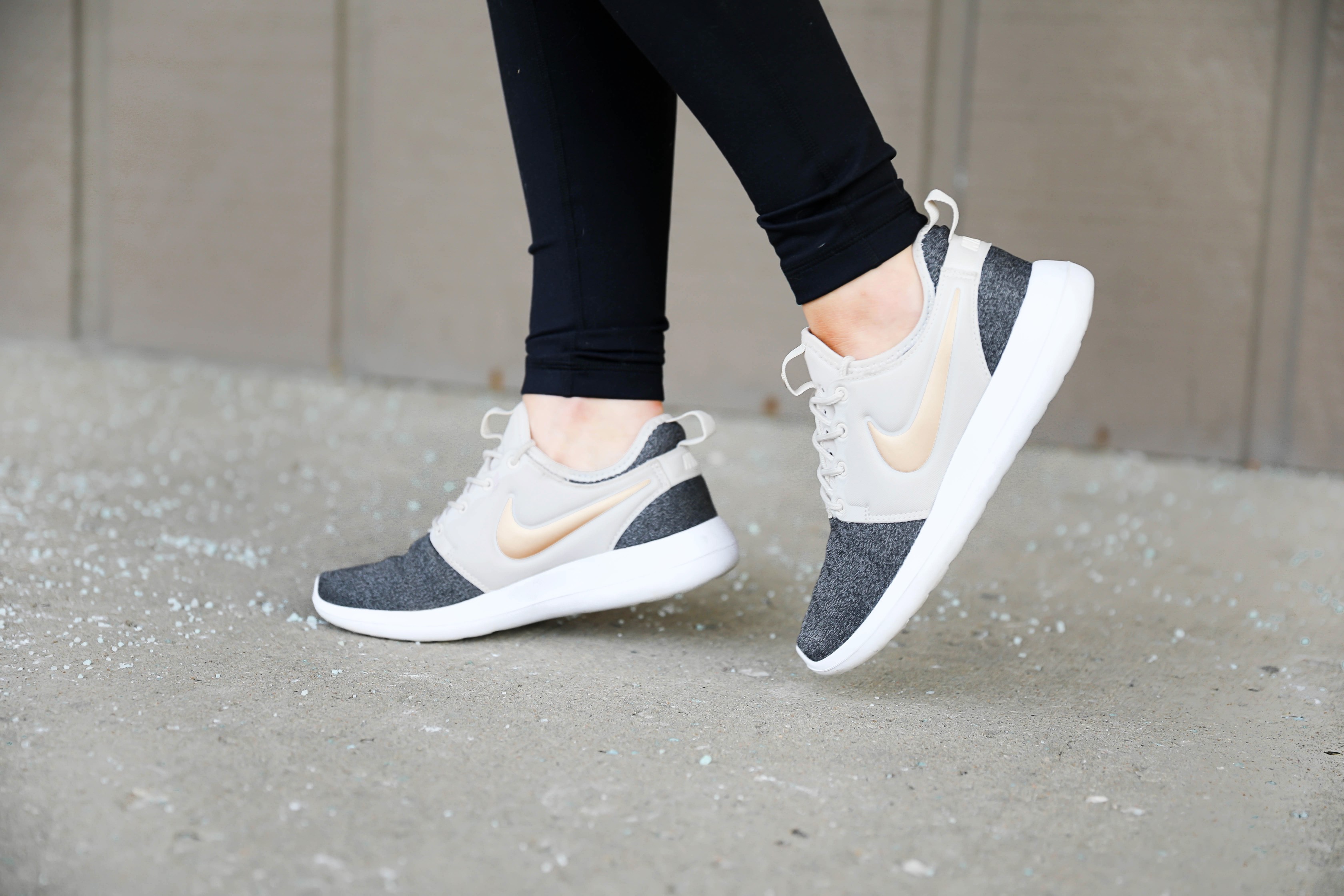 Cute workout look ideas! Athleisure outfit with a cute nike cropped tee, zella high waisted leggings, and nike two tone mesh sneakers with a gold logo! I love this athletic wear look! Details on fashion blog daily dose of charm lauren lindmark