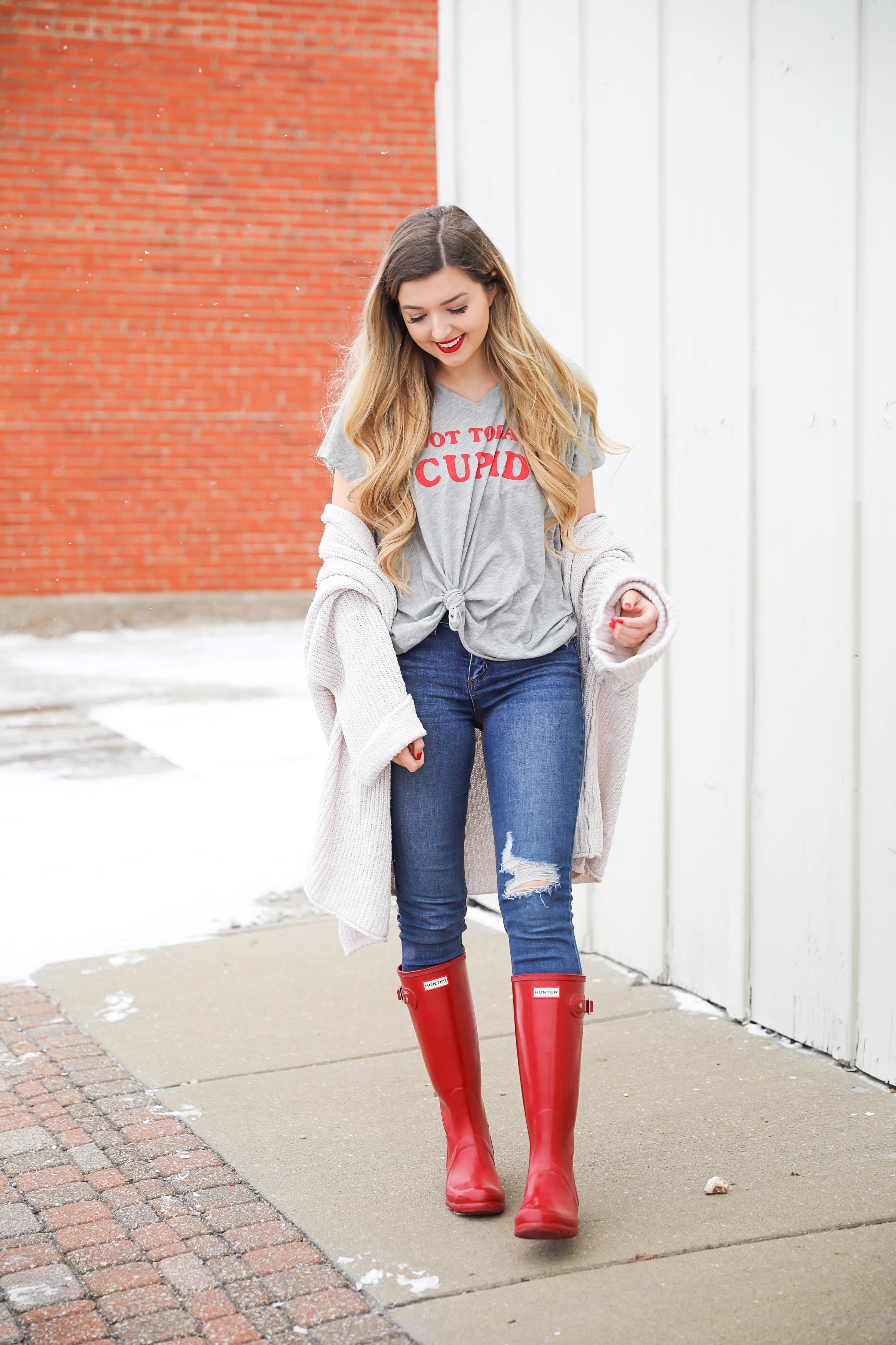 Not today cupid valentine's day tee! Single tee for Valentine's Day. I love this funny valentine's day shirt with free people low tide cardigan over it! I paired it with my red glossy hunter boots! Details on daily dose of charm by lauren lindmark