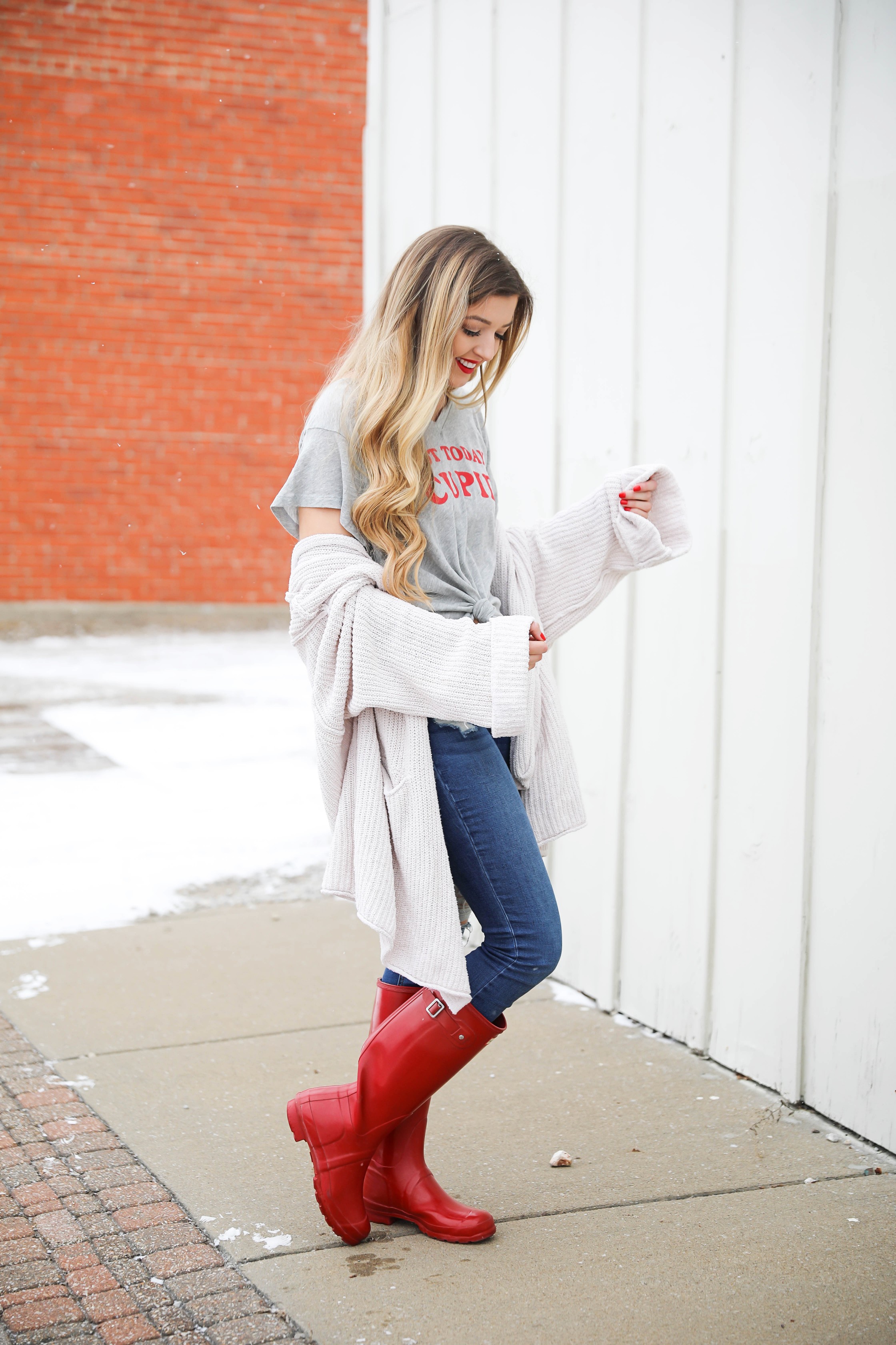 Not today cupid valentine's day tee! Single tee for Valentine's Day. I love this funny valentine's day shirt with free people low tide cardigan over it! I paired it with my red glossy hunter boots! Details on daily dose of charm by lauren lindmark