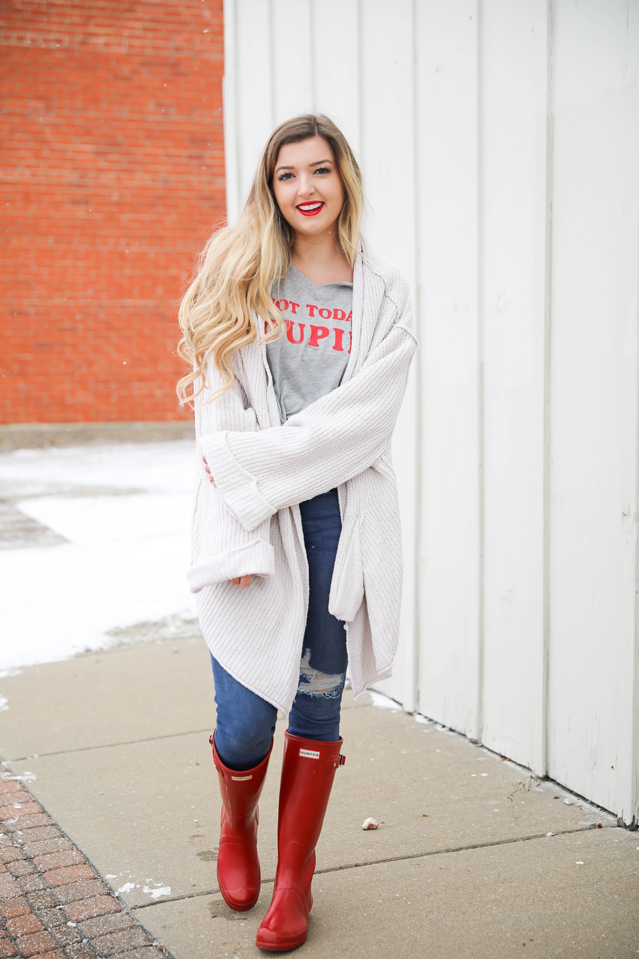 Not today cupid valentine's day tee! Single tee for Valentine's Day. I love this funny valentine's day shirt with free people low tide cardigan over it! I paired it with my red glossy hunter boots! Details on daily dose of charm by lauren lindmark