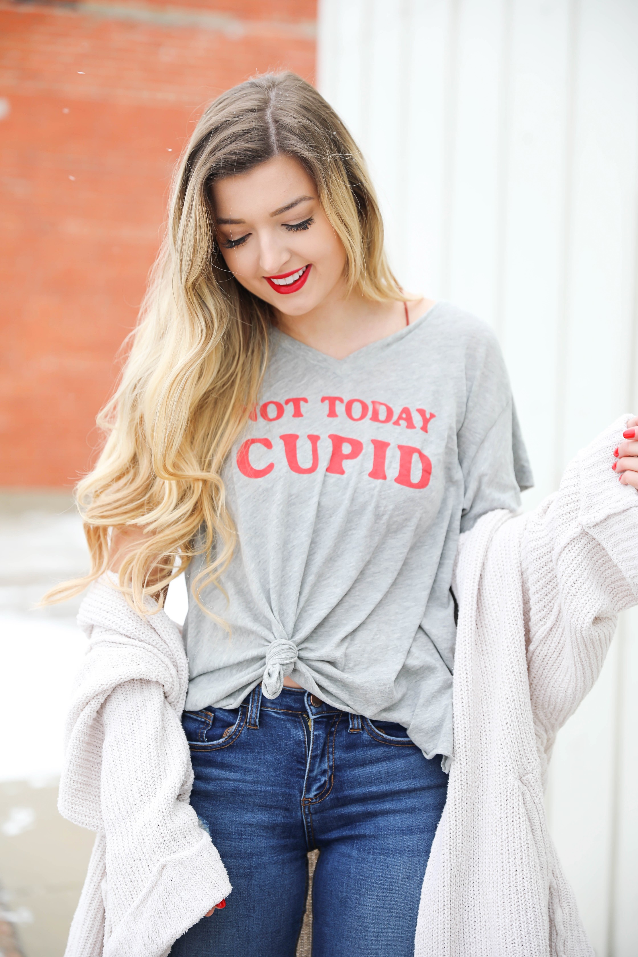 Not today cupid valentine's day tee! Single tee for Valentine's Day. I love this funny valentine's day shirt with free people low tide cardigan over it! I paired it with my red glossy hunter boots! Details on daily dose of charm by lauren lindmark