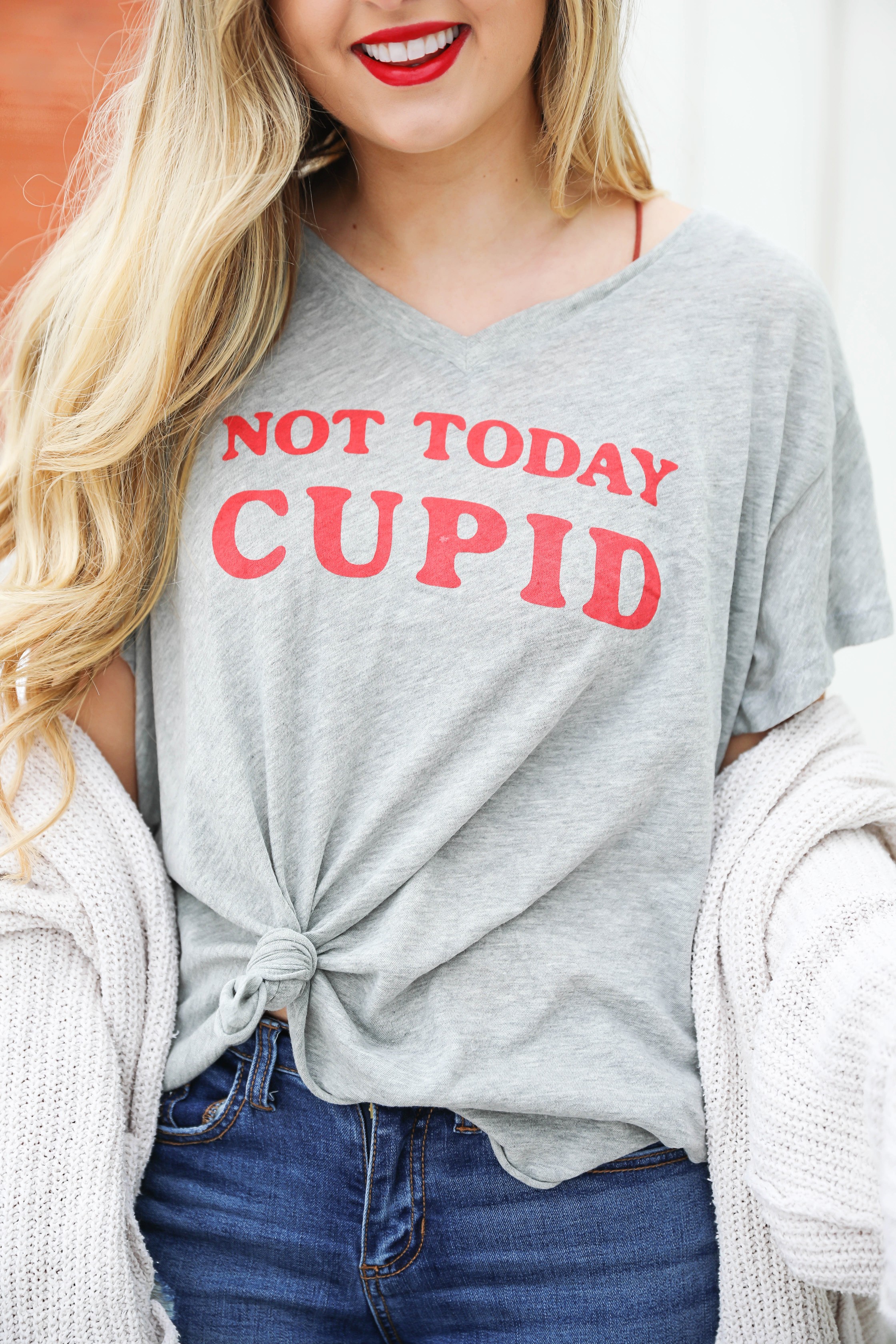 Not today cupid valentine's day tee! Single tee for Valentine's Day. I love this funny valentine's day shirt with free people low tide cardigan over it! I paired it with my red glossy hunter boots! Details on daily dose of charm by lauren lindmark