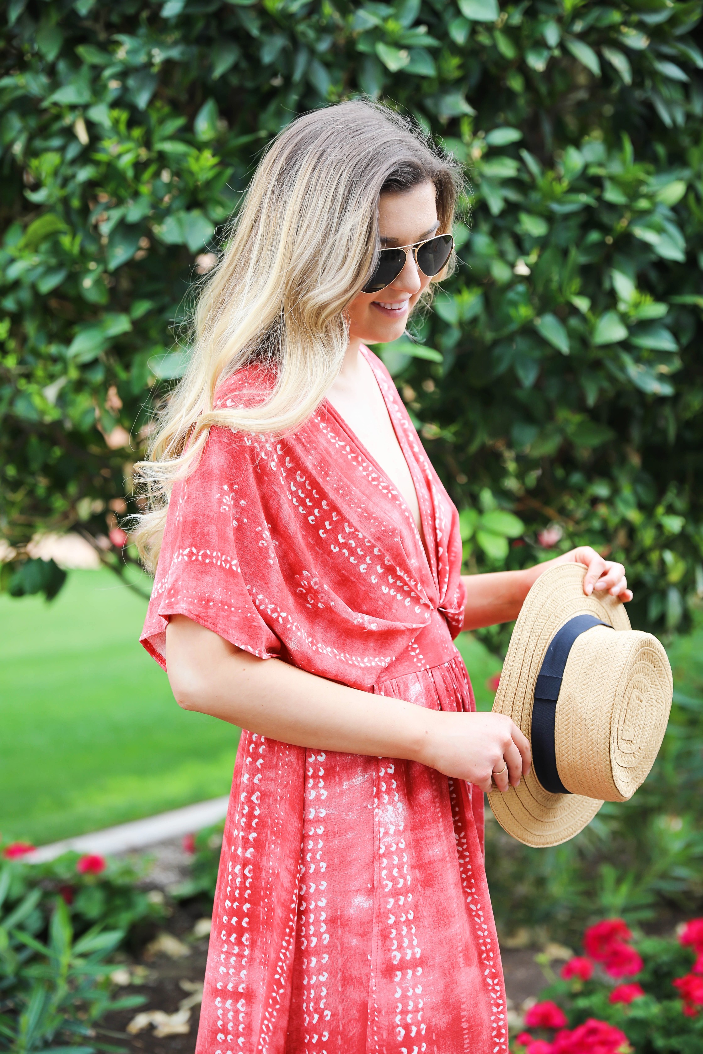 https://dailydoseofcharm.com/wp-content/uploads/2018/02/red-tie-dye-maxi-dress-with-plunging-neck-line-fashion-blog-daily-dose-of-charm-by-lauren-lindmark-spring-break-outfit-ideas-4P6A4511.jpg