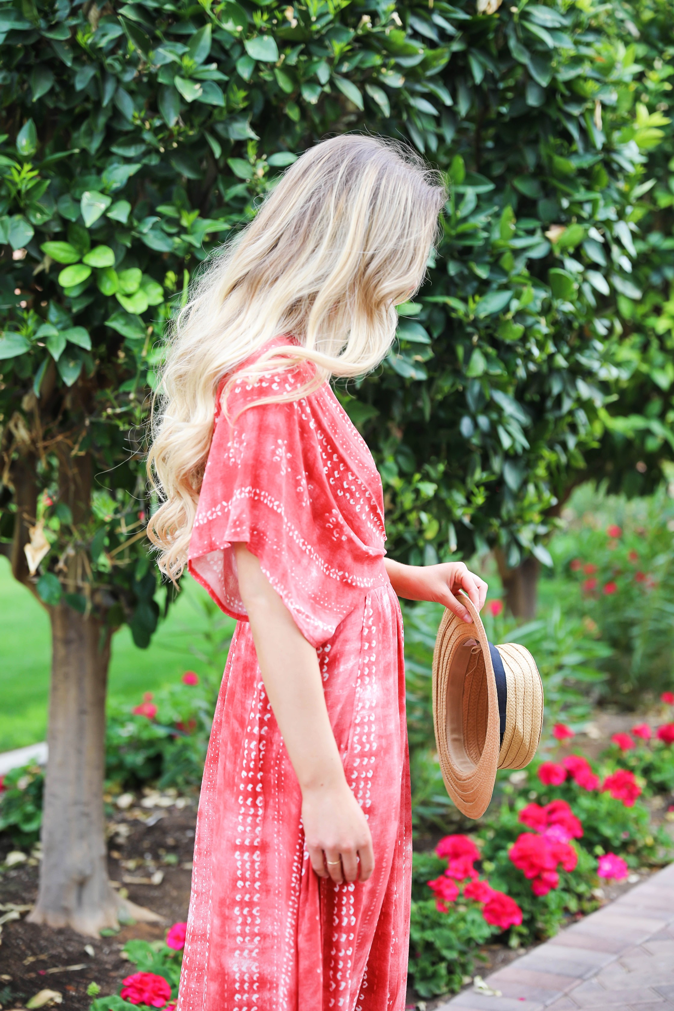 Red tie dye maxi dress from Showpo! Maxi dress with a cute plunging neckline paired with astraw hat and Marc fisher wedges! Details on fashion blog daily dose of charm by lauren lindmark spring break outfit ideas