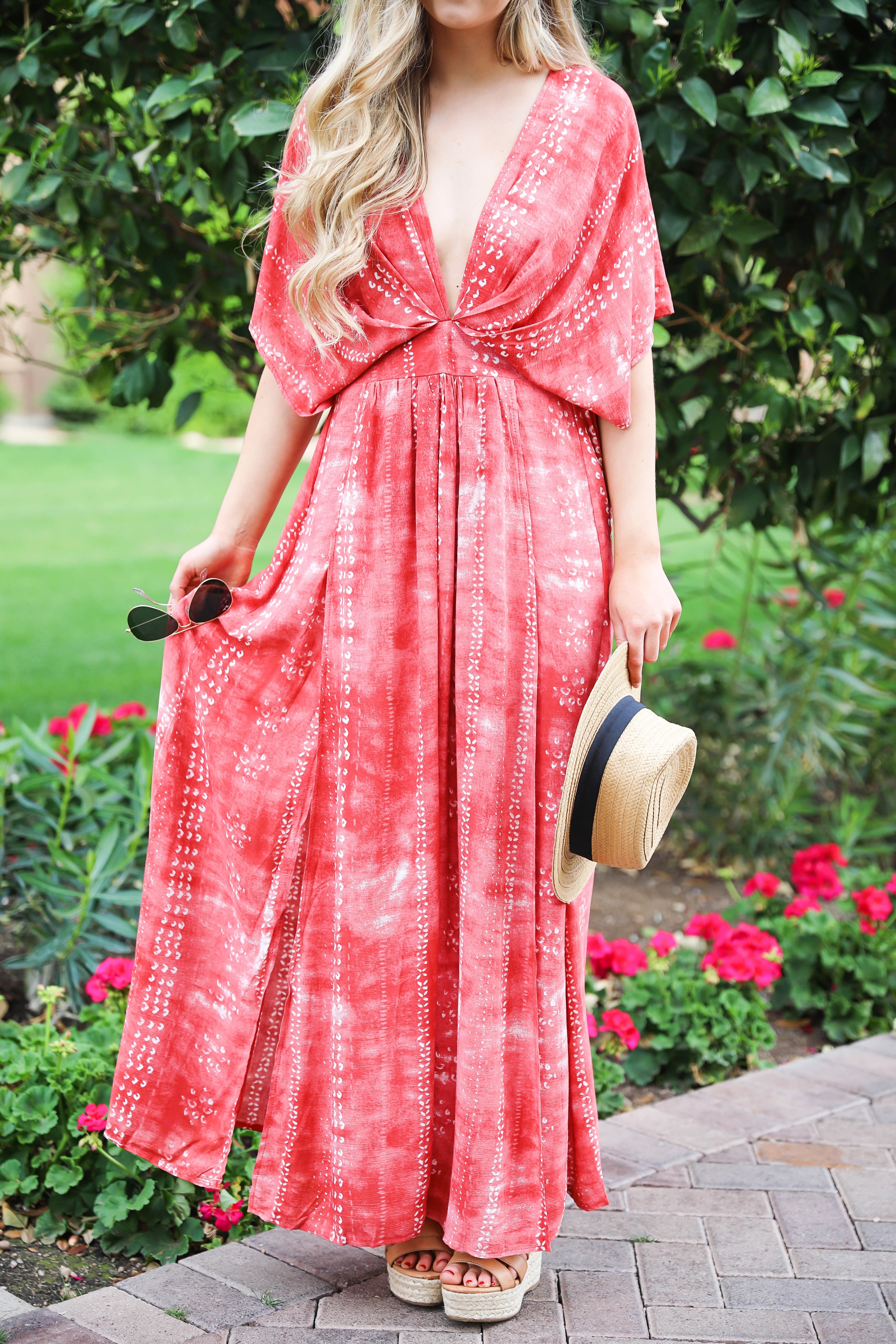 Red tie dye maxi dress from Showpo! Maxi dress with a cute plunging neckline paired with astraw hat and Marc fisher wedges! Details on fashion blog daily dose of charm by lauren lindmark spring break outfit ideas