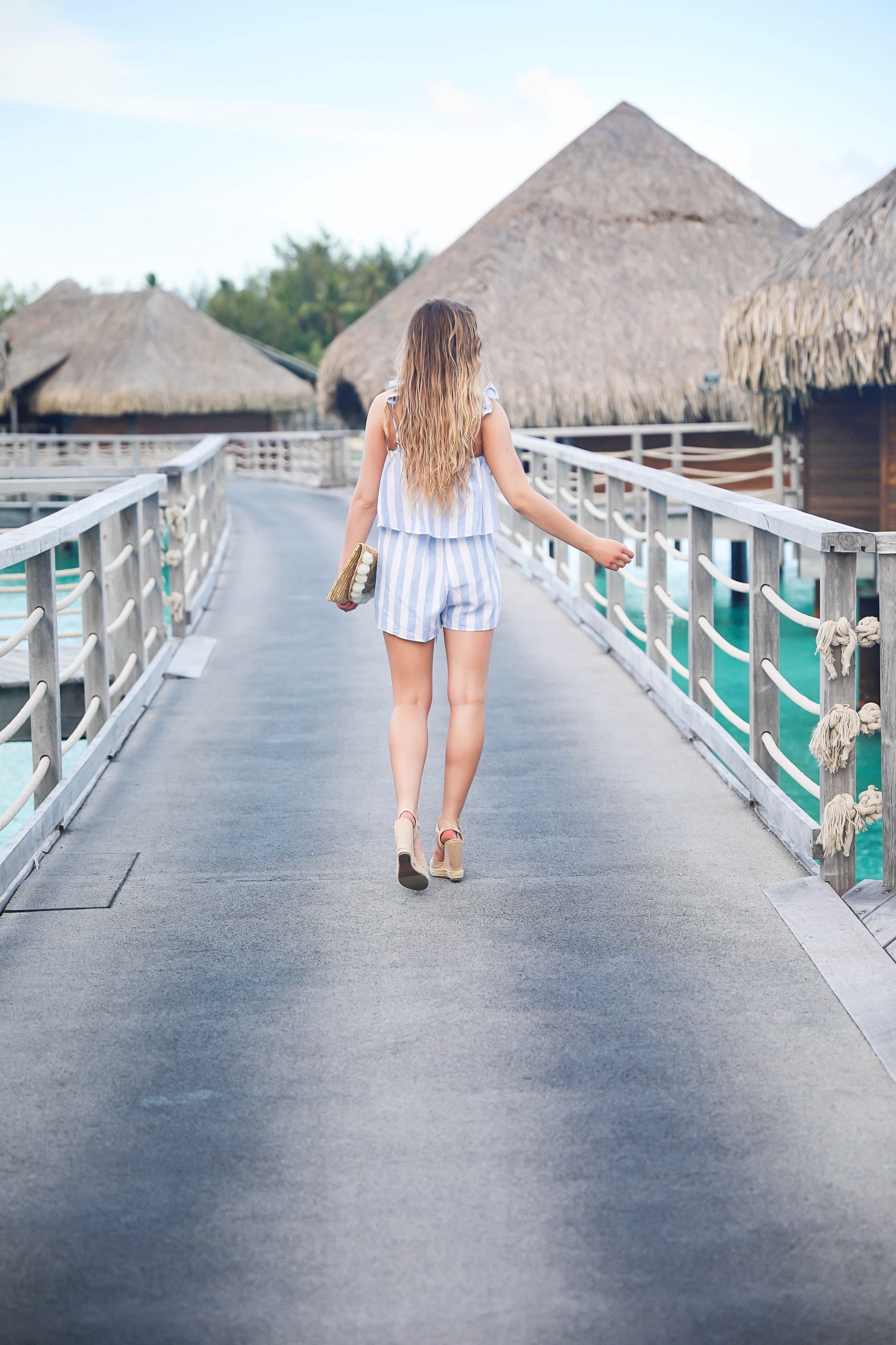 Bora Bora Intercontinental Hotel Thalasso! Trip to Bora Bora on fashion and travel blog Daily Dose of Charm by Lauren Lindmark! The perfect beach outfit! Striped blue and white two piece outfit!