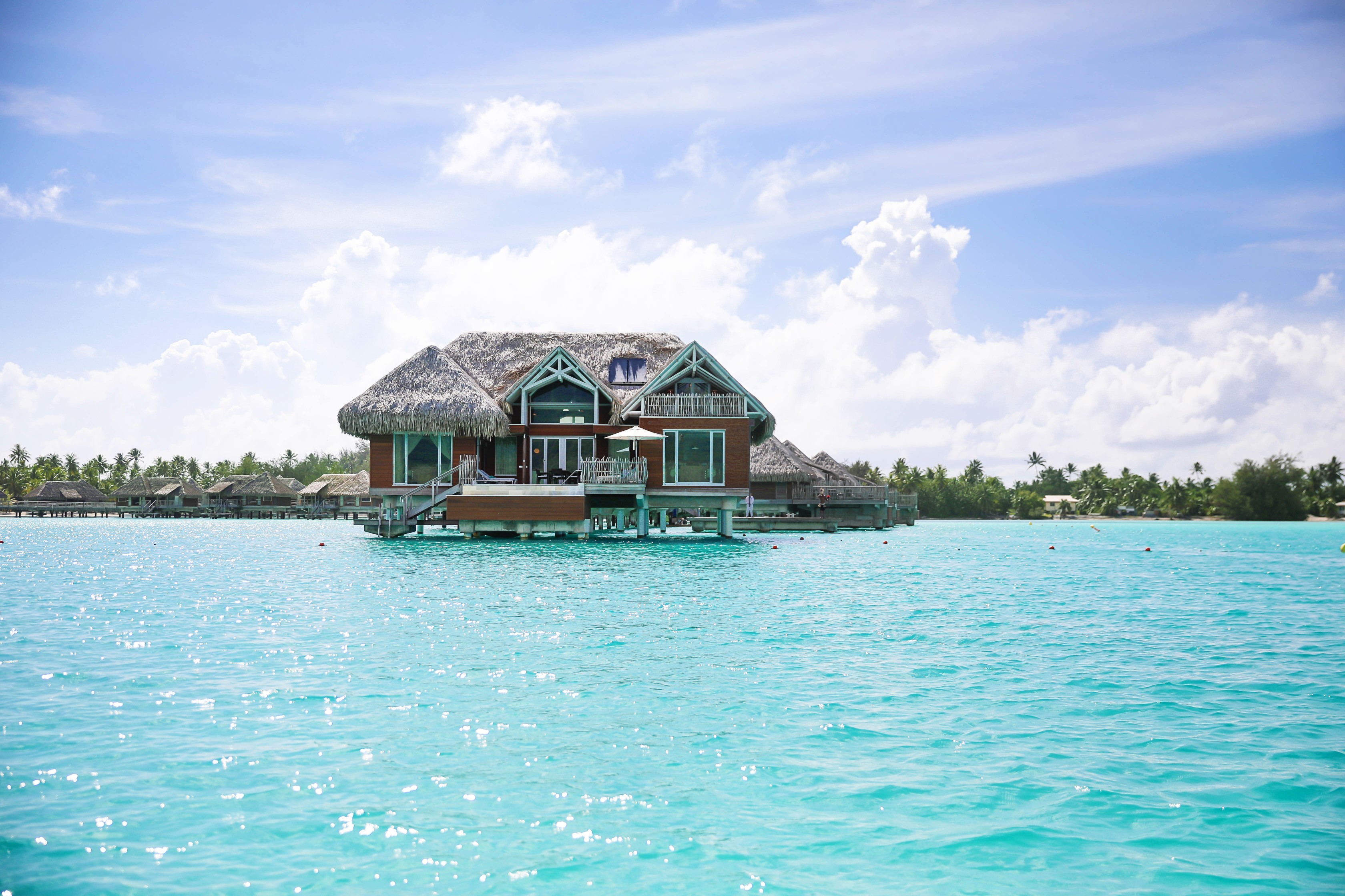 Bora Bora Villa tour at the Intercontinental Hotel Thalasso ! Lauren Lindmark is a fashion and travel blogger! See travel photos of the beautiful blue ocean in Bora Bora, French Polynesia on fashion blog daily dose of charm by lauren Lindmark