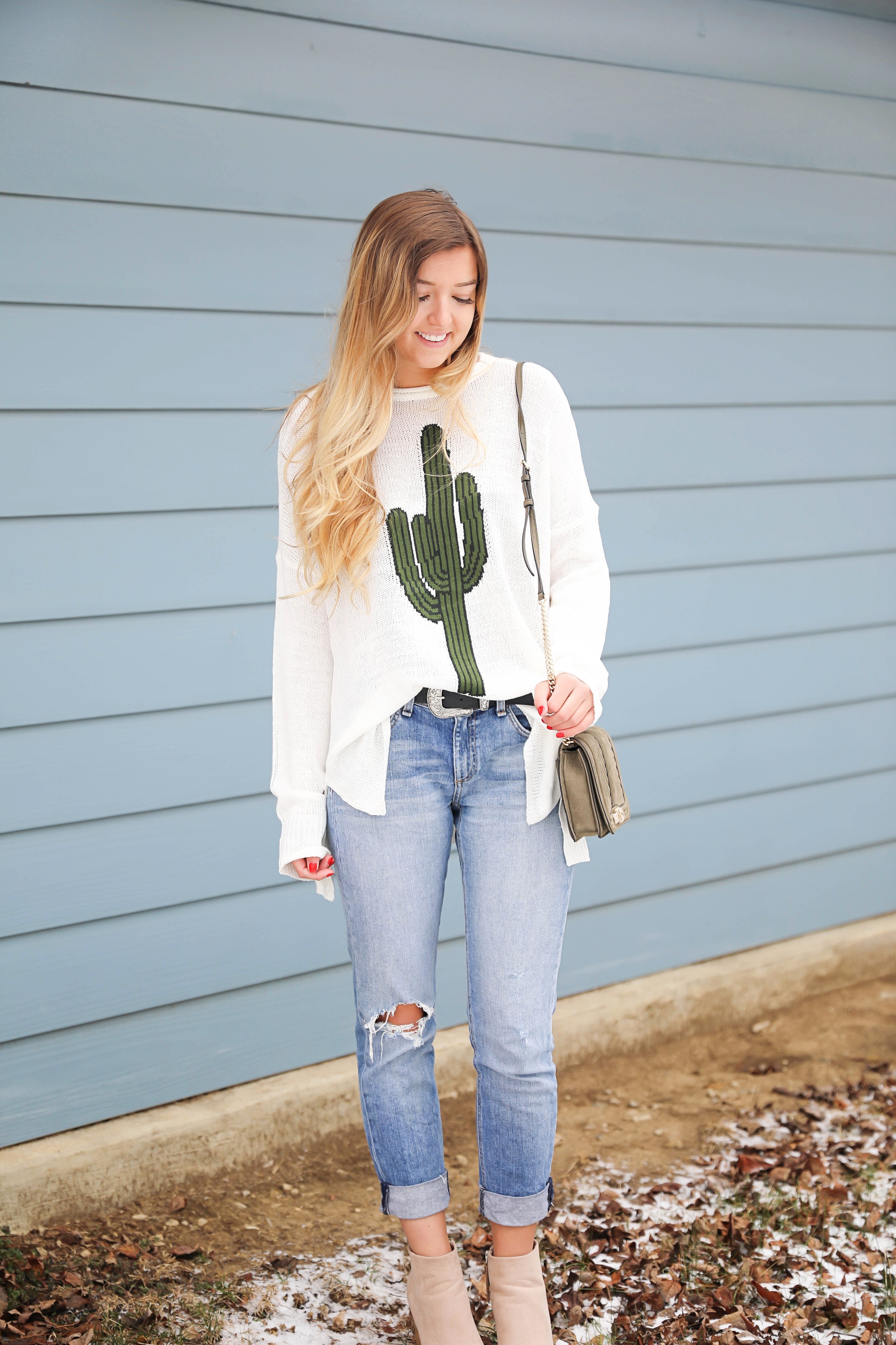 Super cute cactus sweater for spring and summer! This sweater is by Show Me Your Mumu. I love their spring cactus line, but this cactus sweater is my favorite! I paired it with booties, a black belt, and a Rebecca Minkoff bag! Perfect spring outfit inspiration on fashion blog daily dose of charm by lauren lindmark