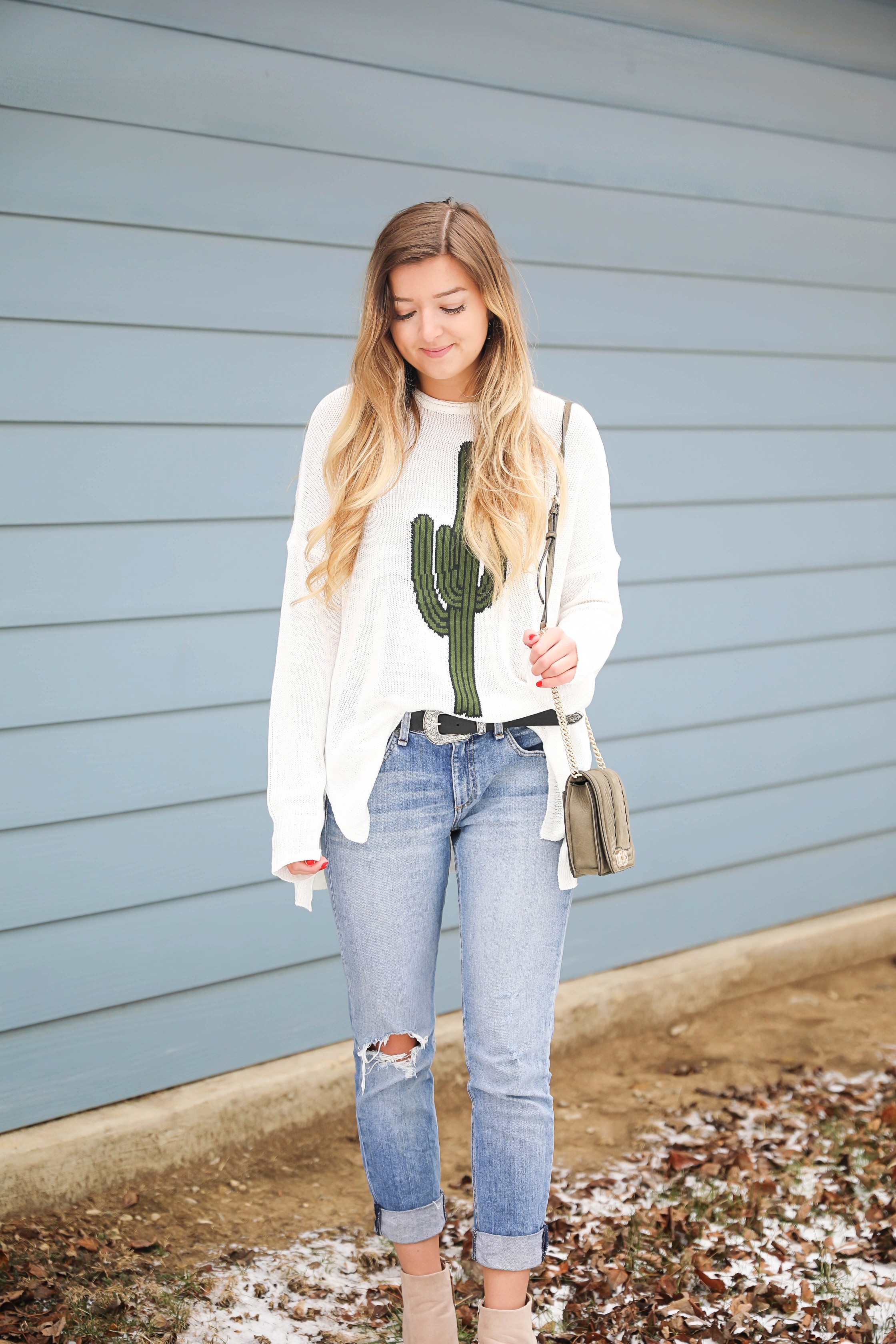 Super cute cactus sweater for spring and summer! This sweater is by Show Me Your Mumu. I love their spring cactus line, but this cactus sweater is my favorite! I paired it with booties, a black belt, and a Rebecca Minkoff bag! Perfect spring outfit inspiration on fashion blog daily dose of charm by lauren lindmark