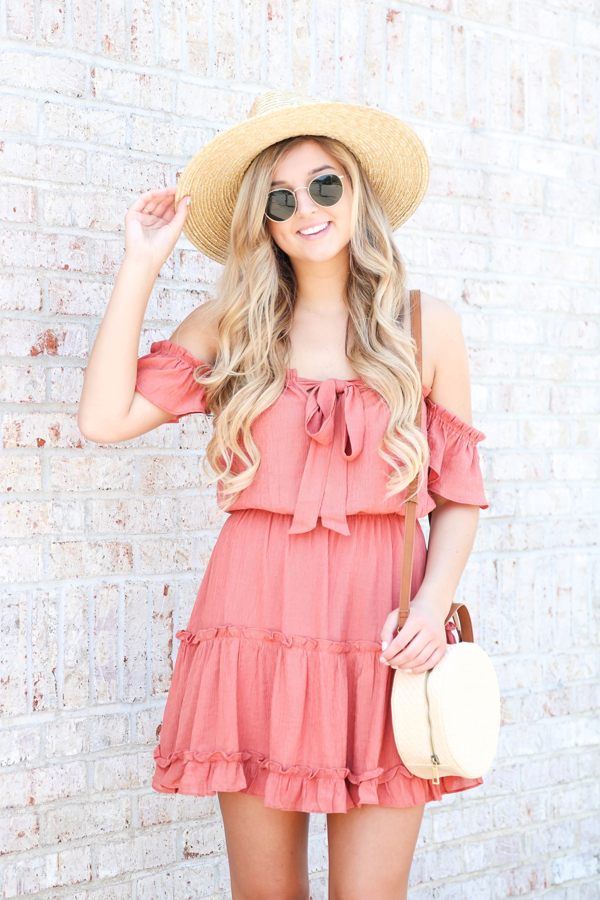 Coral tiered dress from Showpo paired with my favorite straw hat! This is the perfect summer beach hat and looks so cute with this summer sun dress! Summer fashion ideas on the blow! Details on fashion blog daily dose of charm by lauren lindmark