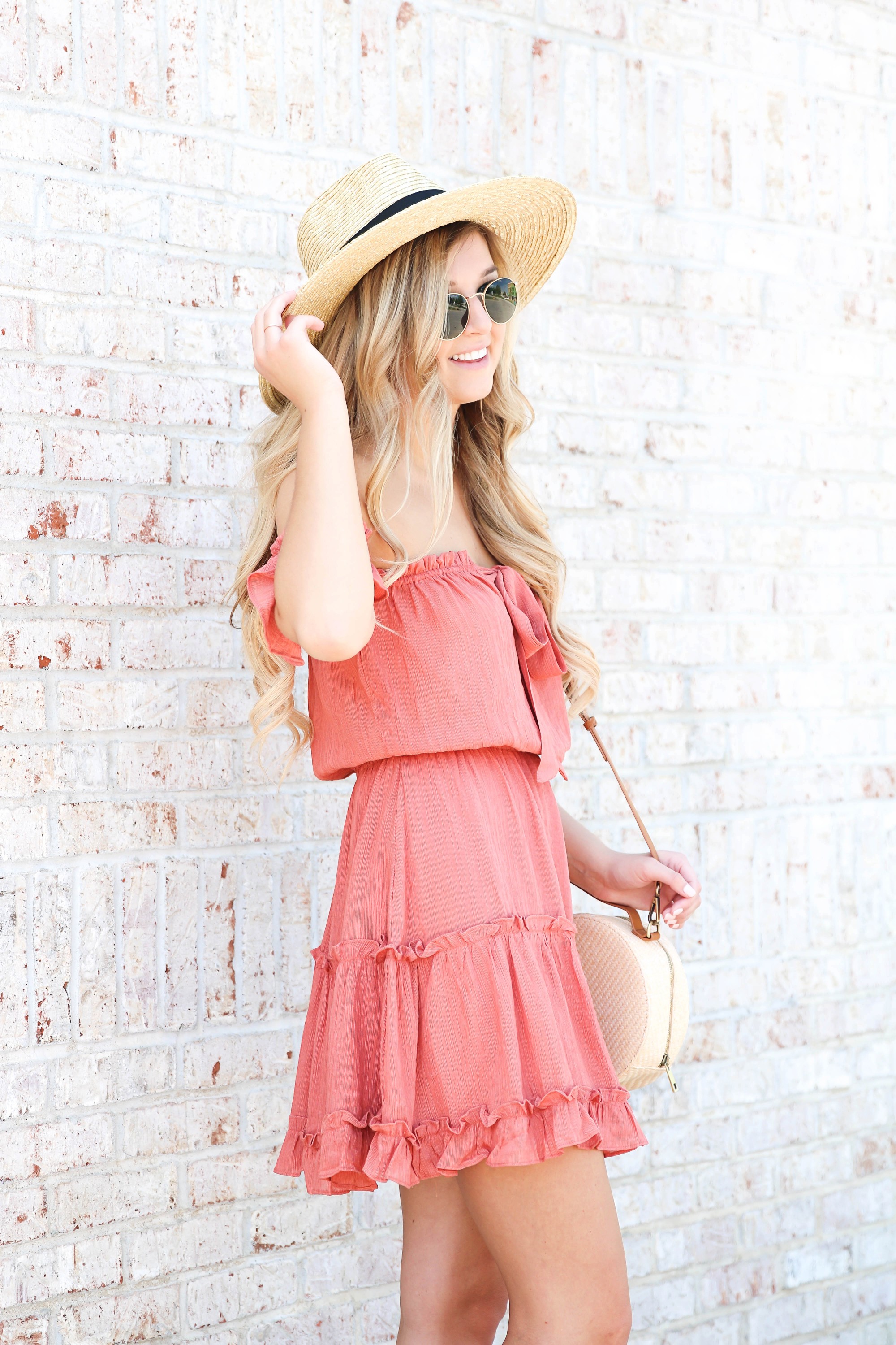 Coral tiered dress from Showpo paired with my favorite straw hat! This is the perfect summer beach hat and looks so cute with this summer sun dress! Summer fashion ideas on the blow! Details on fashion blog daily dose of charm by lauren lindmark