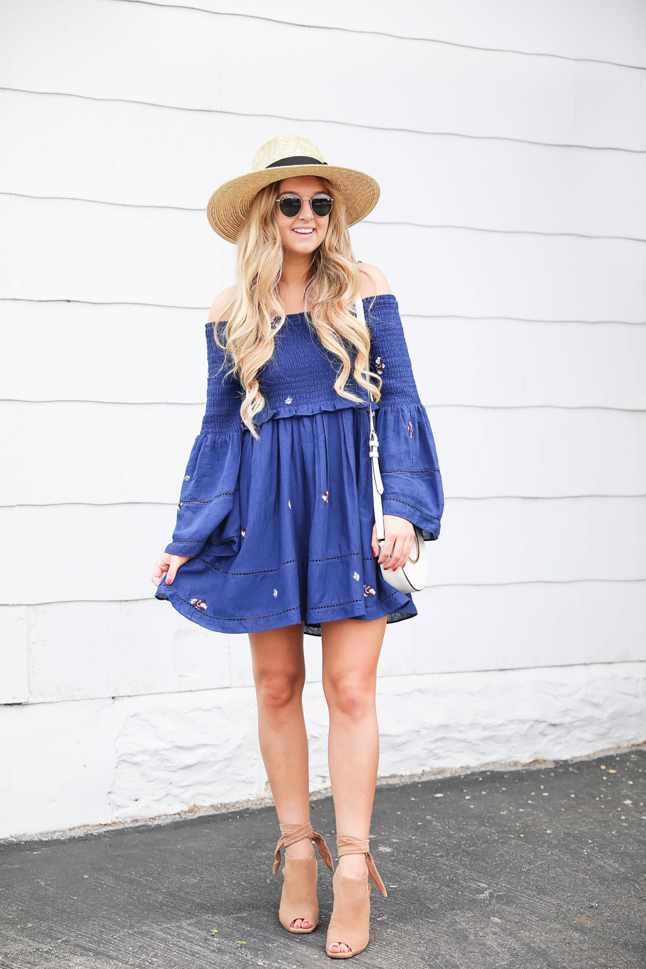 Navy free people off the shoulder embroidered dress! Love this summer fashion look! This summer dress will be perfect for days on the town or nights out! Details on fashion blog daily dose of charm by fashion blogger lauren lindmark