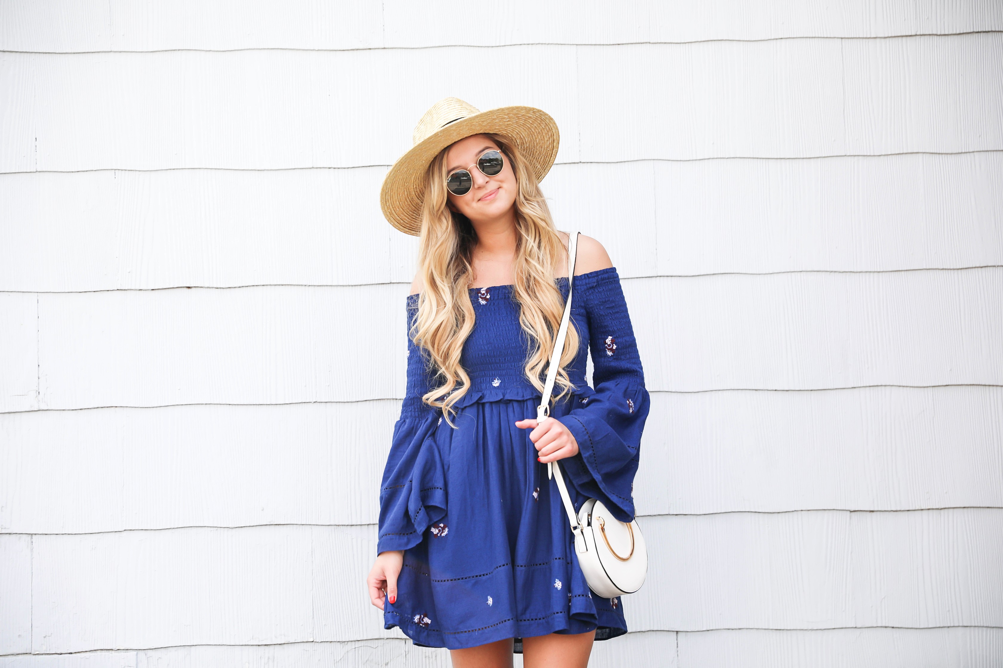 Navy free people off the shoulder embroidered dress! Love this summer fashion look! This summer dress will be perfect for days on the town or nights out! Details on fashion blog daily dose of charm by fashion blogger lauren lindmark