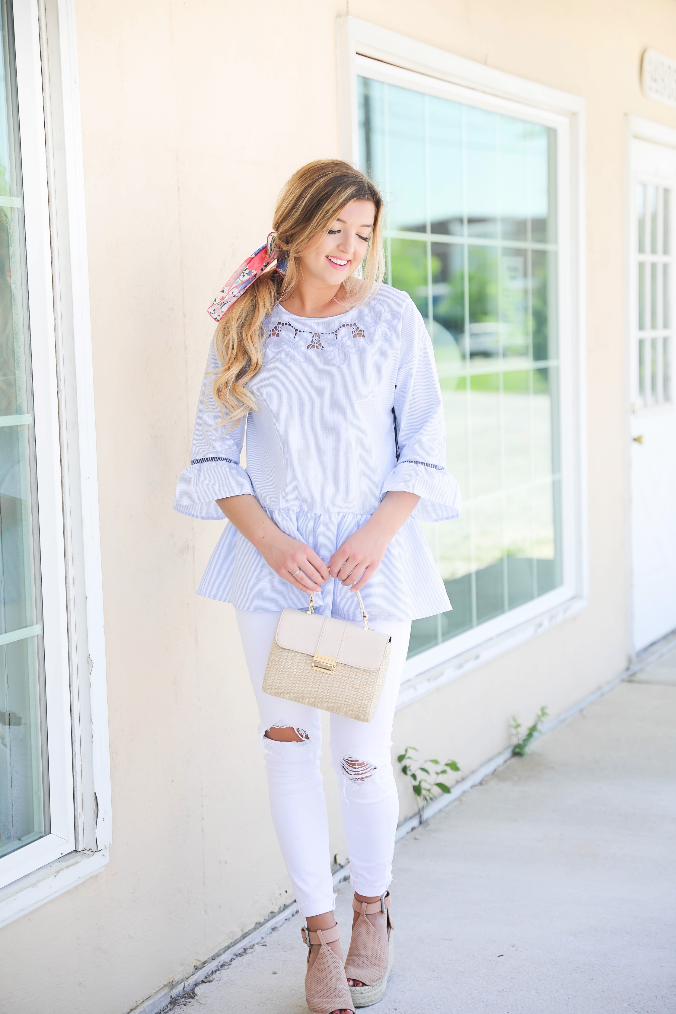 Seersucker peplum top from the Blue Door Boutique paired with white jeans and cute wedges! I love this preppy look, this kate spade silk scarf I super in for spring! I love this spring outfit! Silk scarf hairstyle idea! I love scarves and ponytails on fashion blog daily dose of charm by lauren lindmark