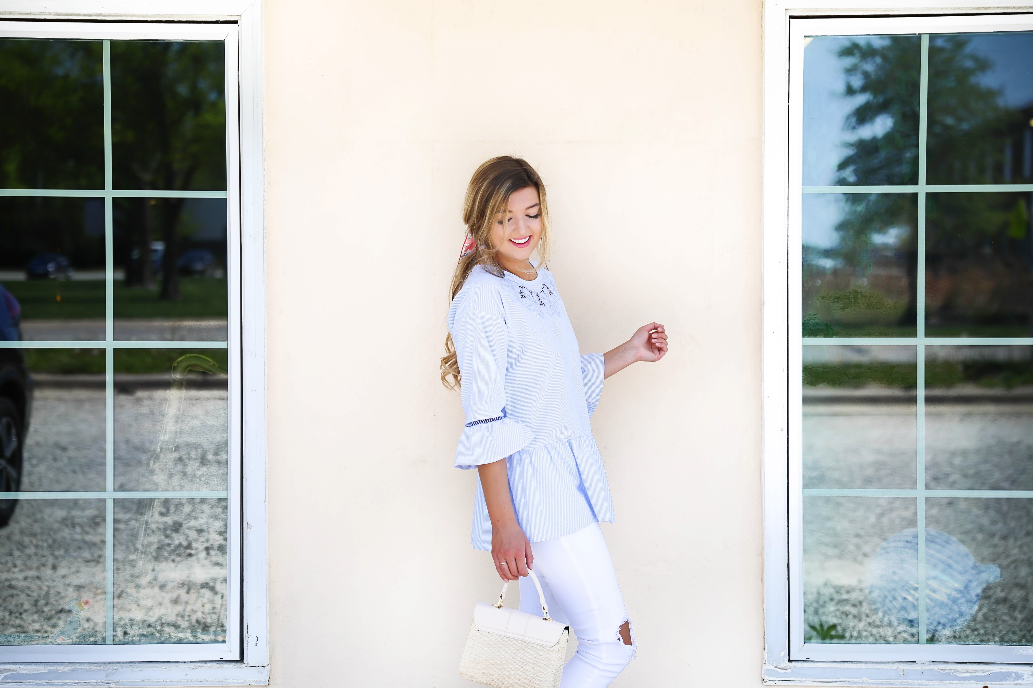 Seersucker peplum top from the Blue Door Boutique paired with white jeans and cute wedges! I love this preppy look, this kate spade silk scarf I super in for spring! I love this spring outfit! Silk scarf hairstyle idea! I love scarves and ponytails on fashion blog daily dose of charm by lauren lindmark