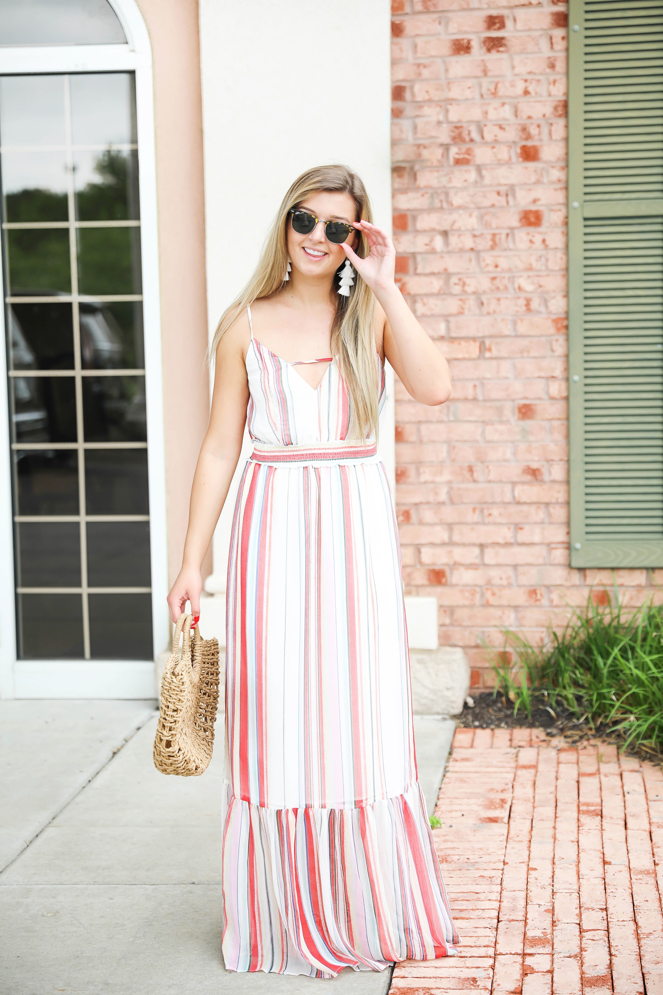 Striped summer maxi dress from revolve! Cute summer fashion and easy outfit ideas! Paired with my favorite straw bag on my blog daily dose of charm by lauren lindmark 