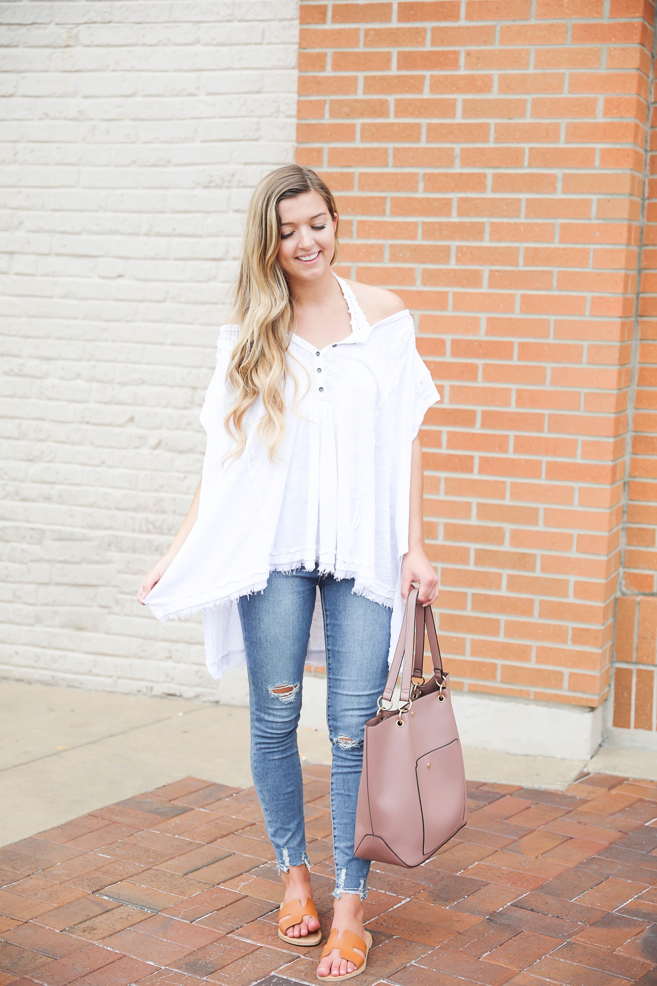 Flowy free people top paired with a bralette! I wore my cute, new articles of society jeans and mauve tote bag from the nordstrom anniversary sale! Such a cute outift to transition into fall! Details on fashion blog daily dose of charm by lauren lindmark