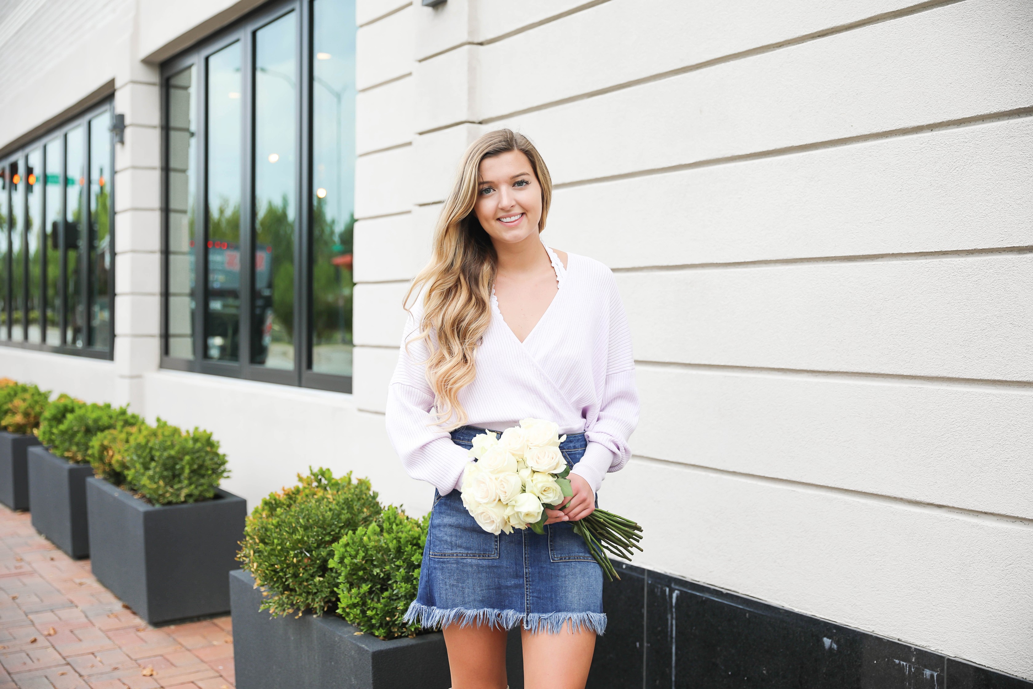 Lavender deep-v sweater from the Nordstrom Anniversary Sale! Paired with a cute white lace bralette and frayed denim skirt! I finished the look with my new over the knee suede boots! All from the nordstrom anniversary sale 2018! Details on fashion blog daily dose of charm by Lauren Lindmark