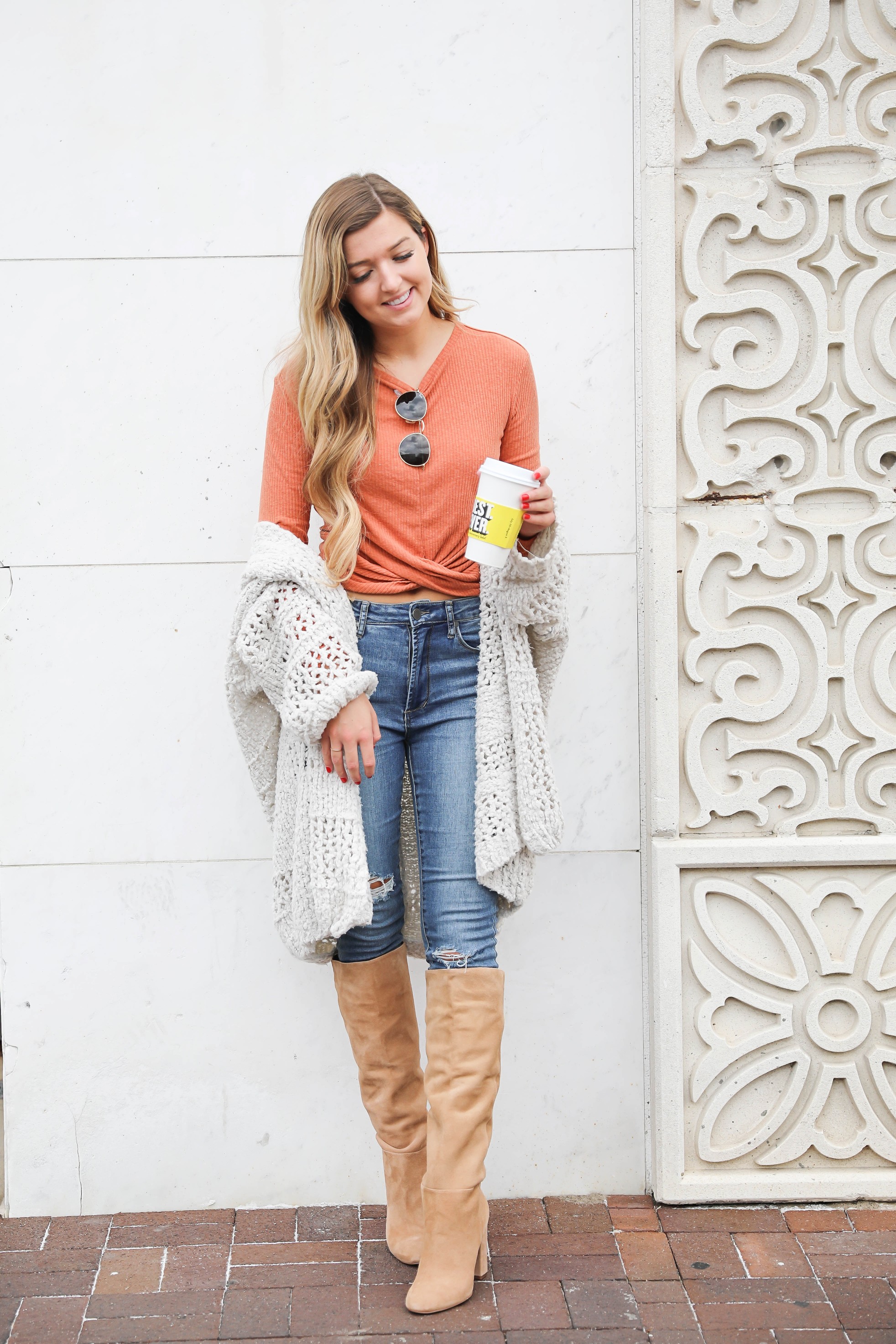 Orange twist top featured in the Nordstrom Anniversary sale paired with this adorable crochet free people cardigan that is also in the sale! They both come in multiple colors and look adorable with my Articles of Society jeans (on sale for $44) and my Sam Edelman boots that are also in the nordstrom anniversary sale 2018! Cutest fall outfit on daily dose of charm by lauren lindmark