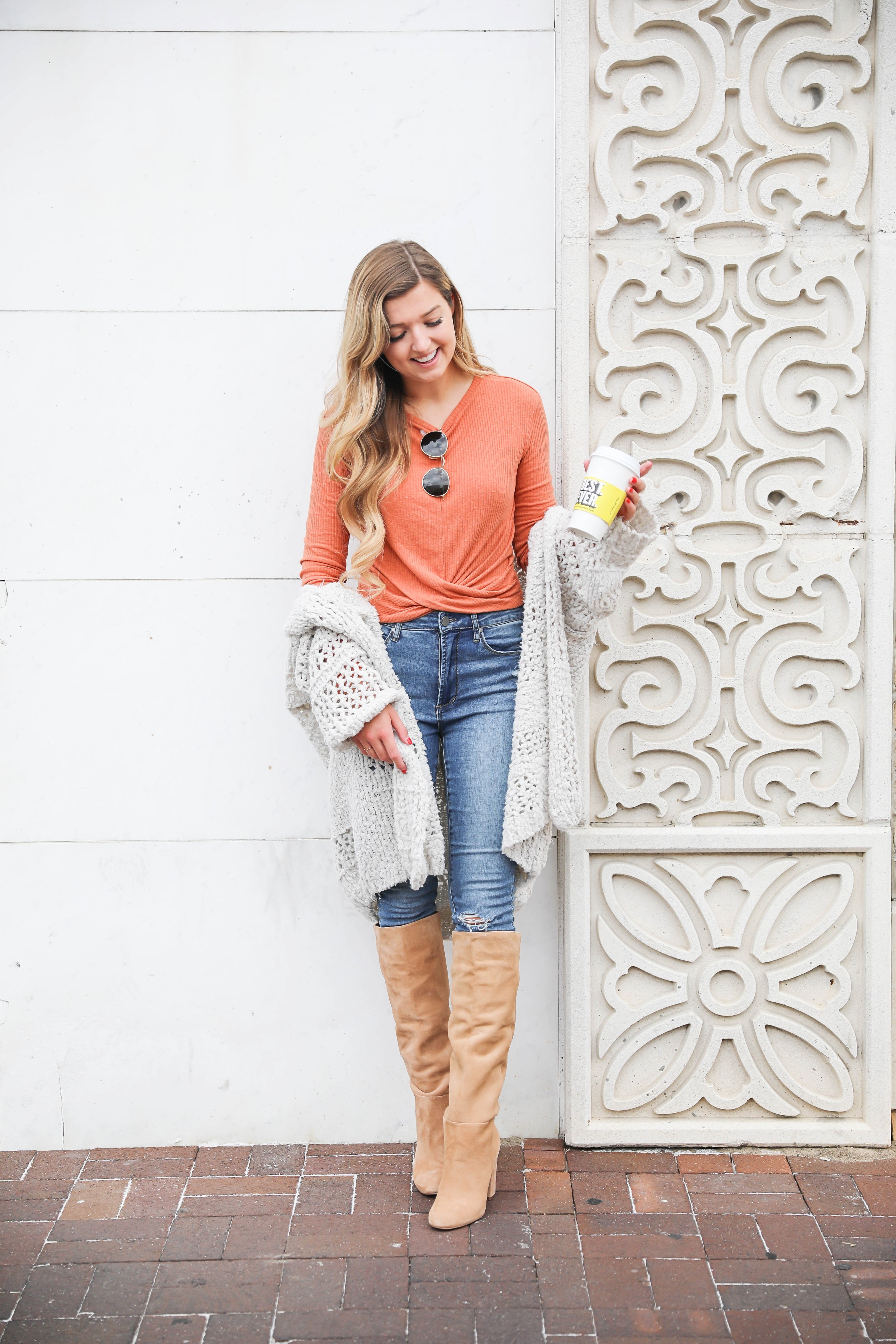 Orange twist top featured in the Nordstrom Anniversary sale paired with this adorable crochet free people cardigan that is also in the sale! They both come in multiple colors and look adorable with my Articles of Society jeans (on sale for $44) and my Sam Edelman boots that are also in the nordstrom anniversary sale 2018! Cutest fall outfit on daily dose of charm by lauren lindmark