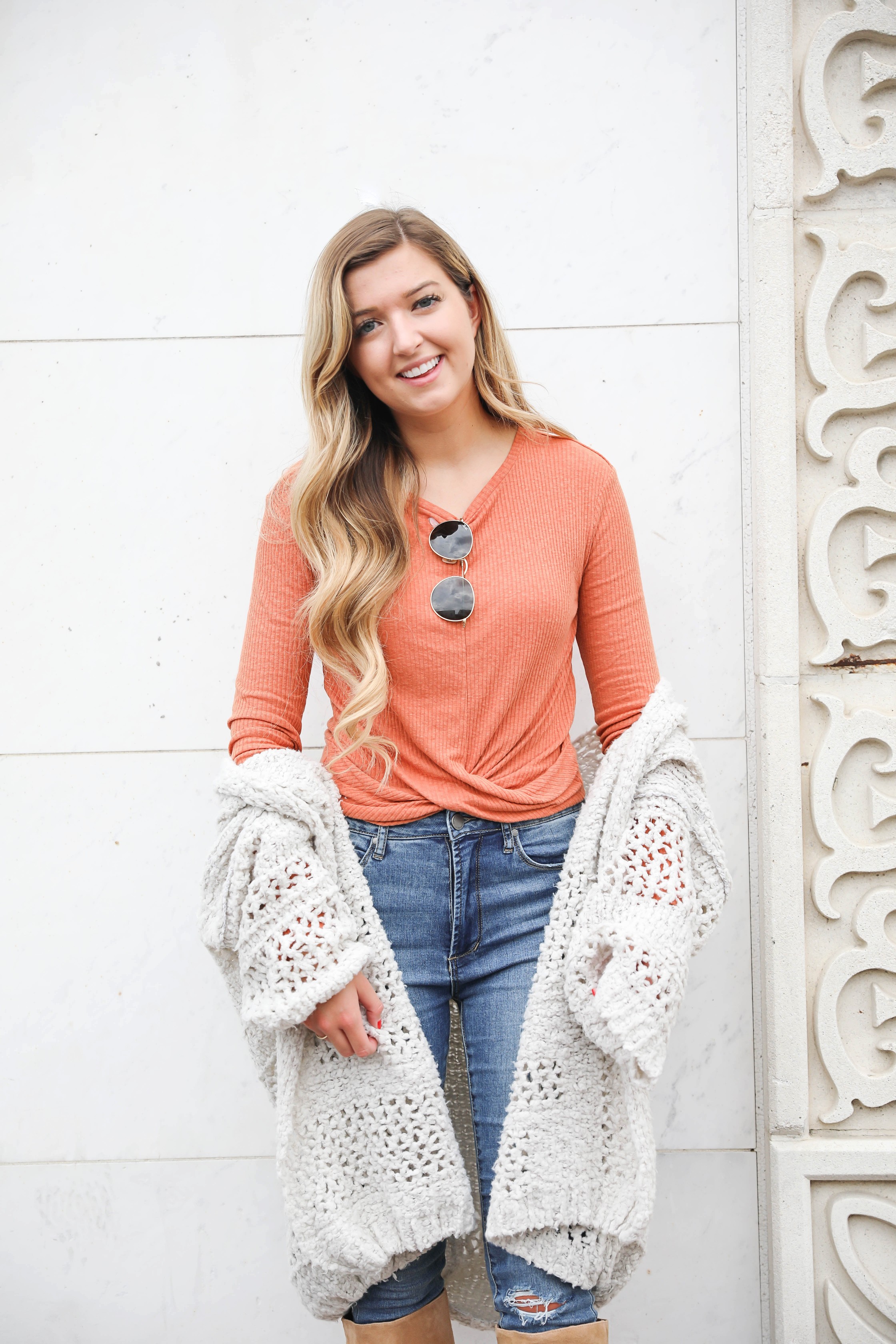 Orange twist top featured in the Nordstrom Anniversary sale paired with this adorable crochet free people cardigan that is also in the sale! They both come in multiple colors and look adorable with my Articles of Society jeans (on sale for $44) and my Sam Edelman boots that are also in the nordstrom anniversary sale 2018! Cutest fall outfit on daily dose of charm by lauren lindmark