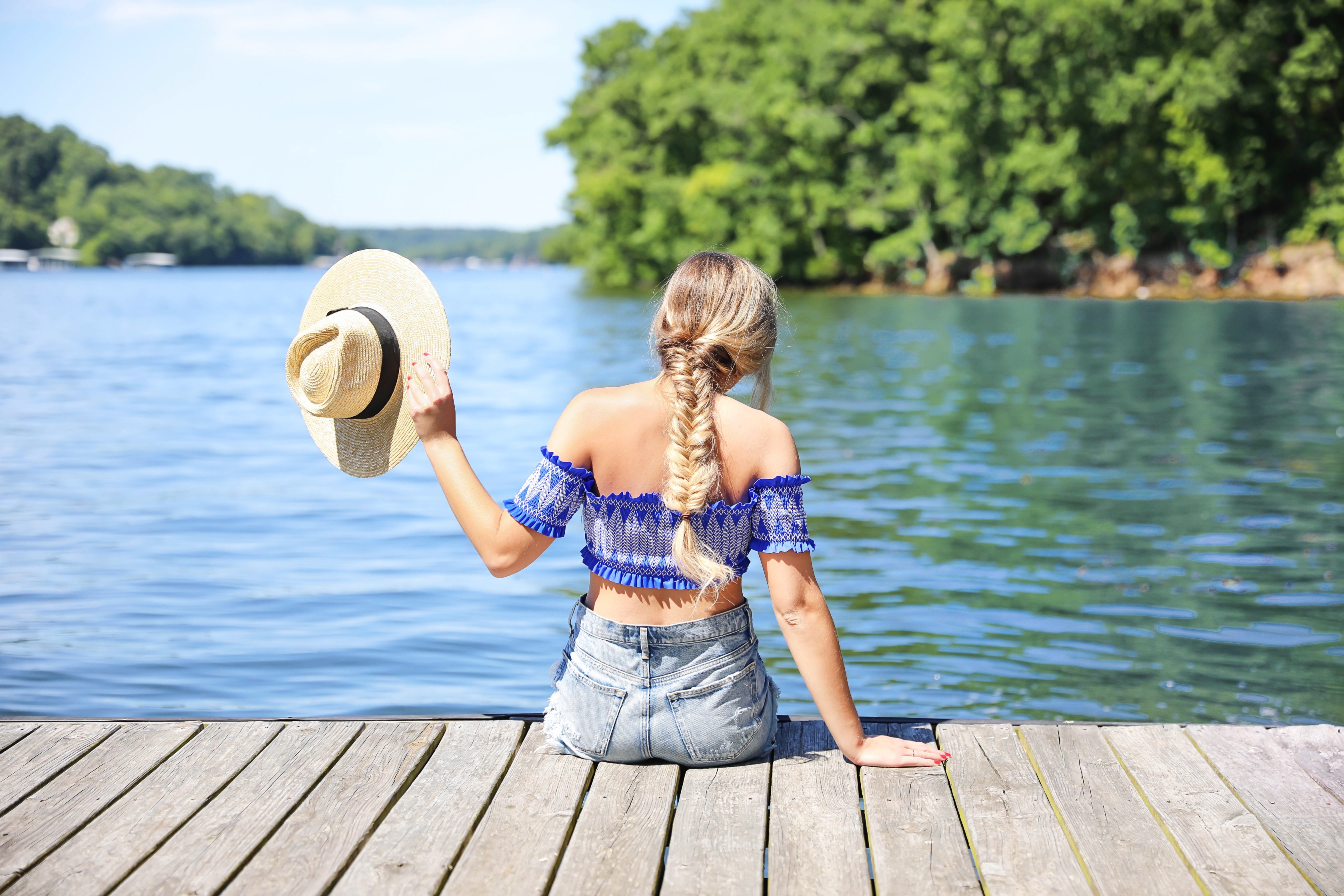 Hair care routine for summer! Royal blue Ted Baker London Smocked Bardot Bikini Top! I love this off the shoulder swimsuit, plus the colors is adorable! Paired with jean shorts at the lake! Perfect summer outfit! Details on fashion blog daily dose of charm by lauren lindmark